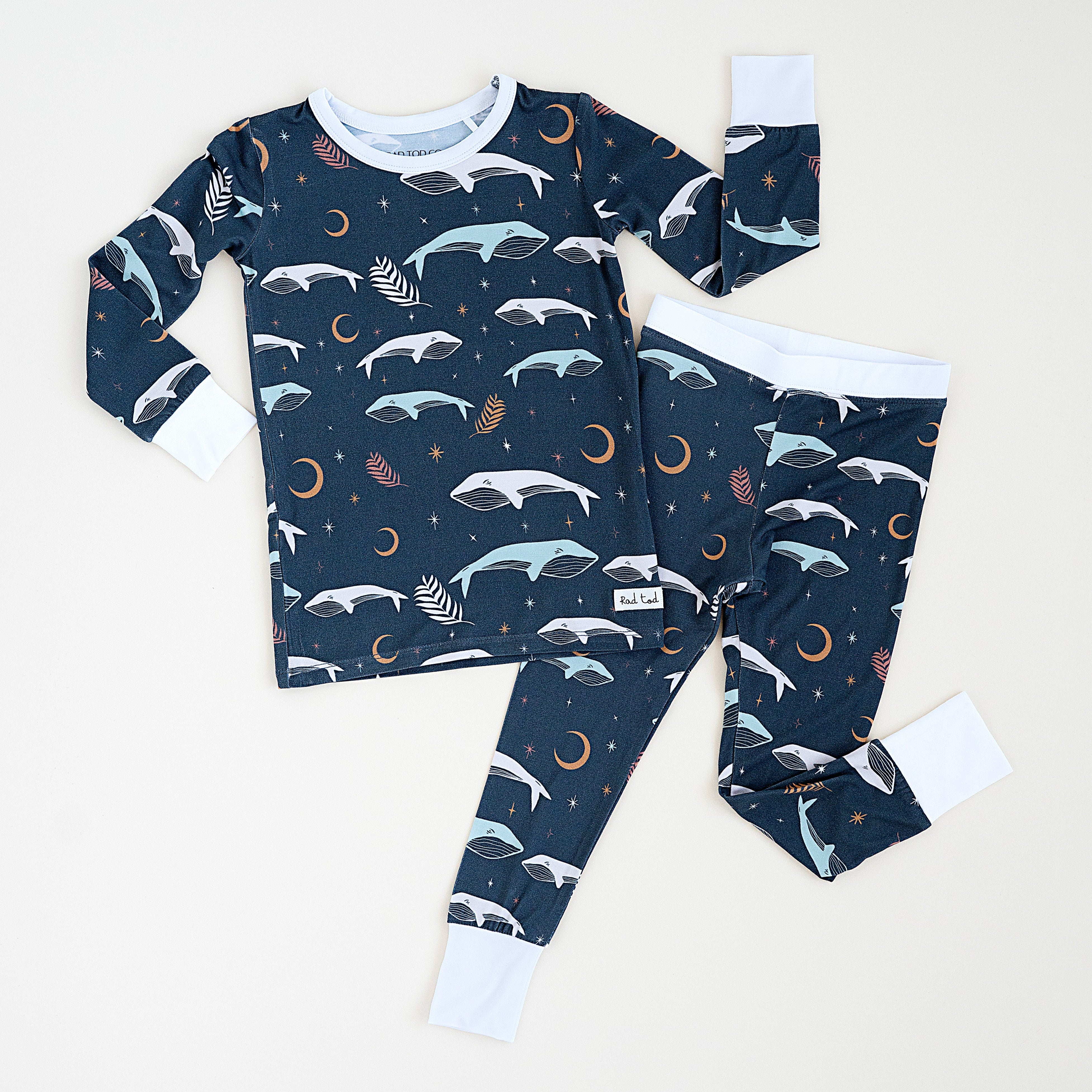 Luna Whale Bamboo Onesie featuring soft, breathable fabric, hypoallergenic properties, and a cute whale design for ultimate comfort and style