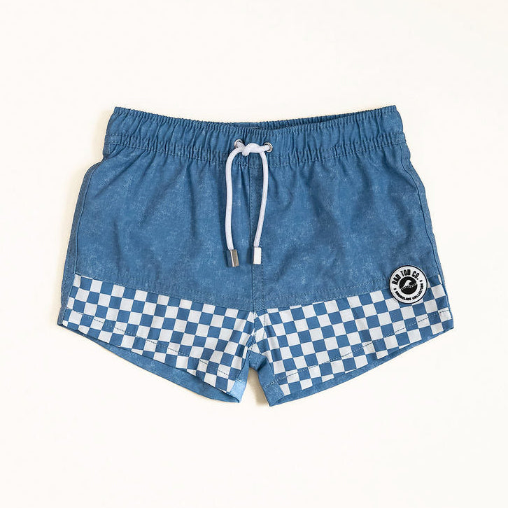 Blue swim shorts with a checkered pattern on a white background