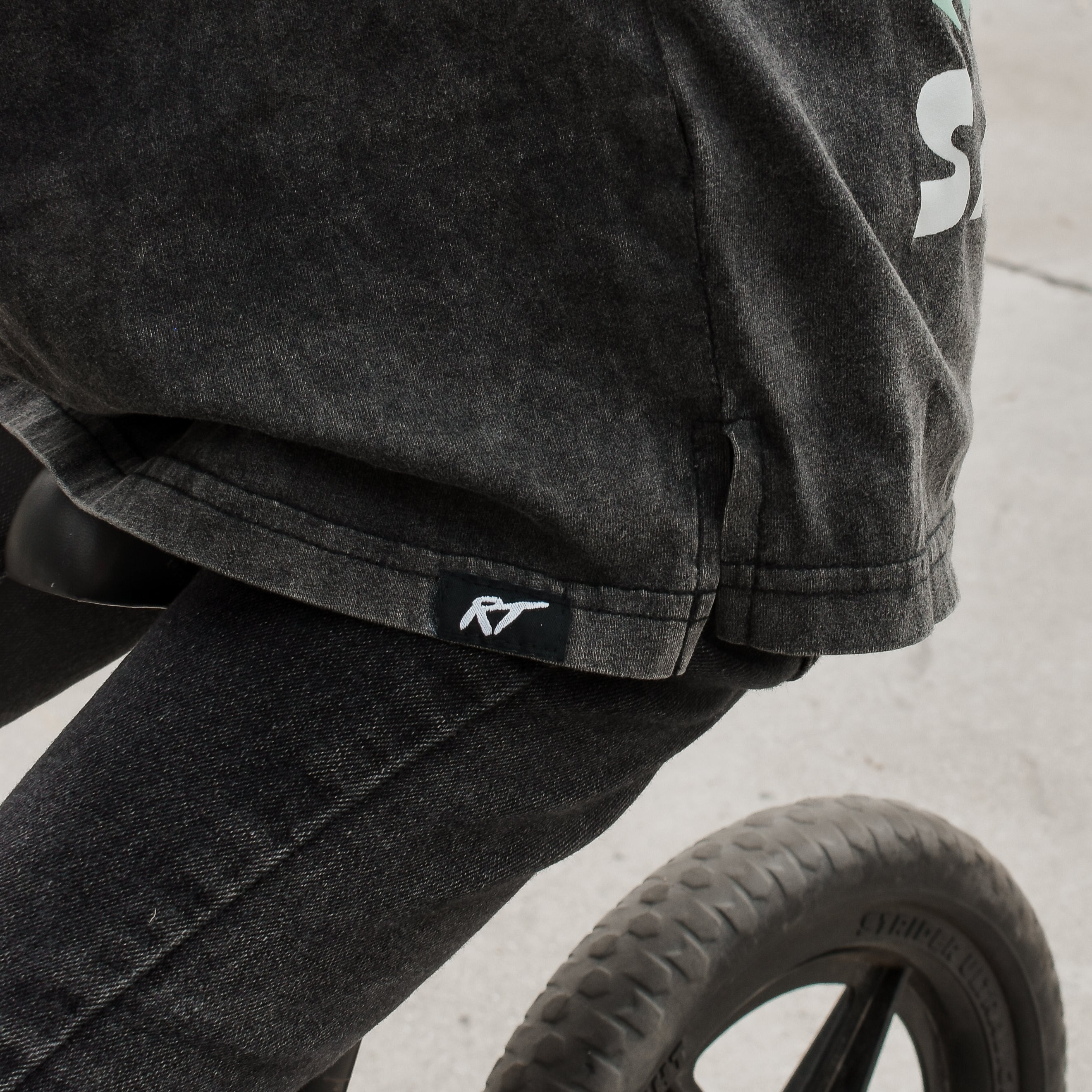 details on the Rad Toddler black acid wash toddler tee with bold 'Salty Bro' text in playful, beach style lettering