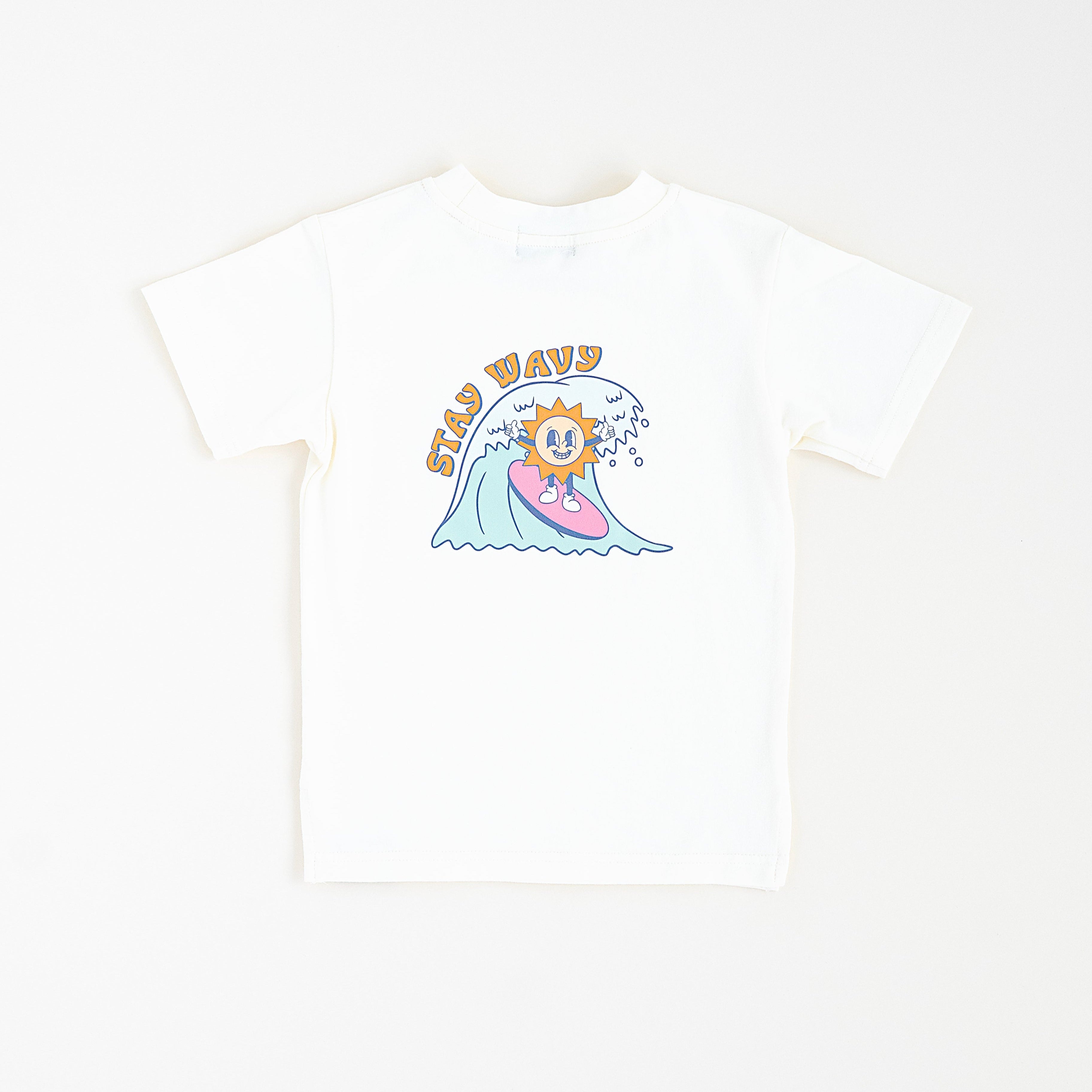 Trendy toddler t-shirt with vibrant designs for comfortable everyday wear this one features a sunny character surfing - RAD!