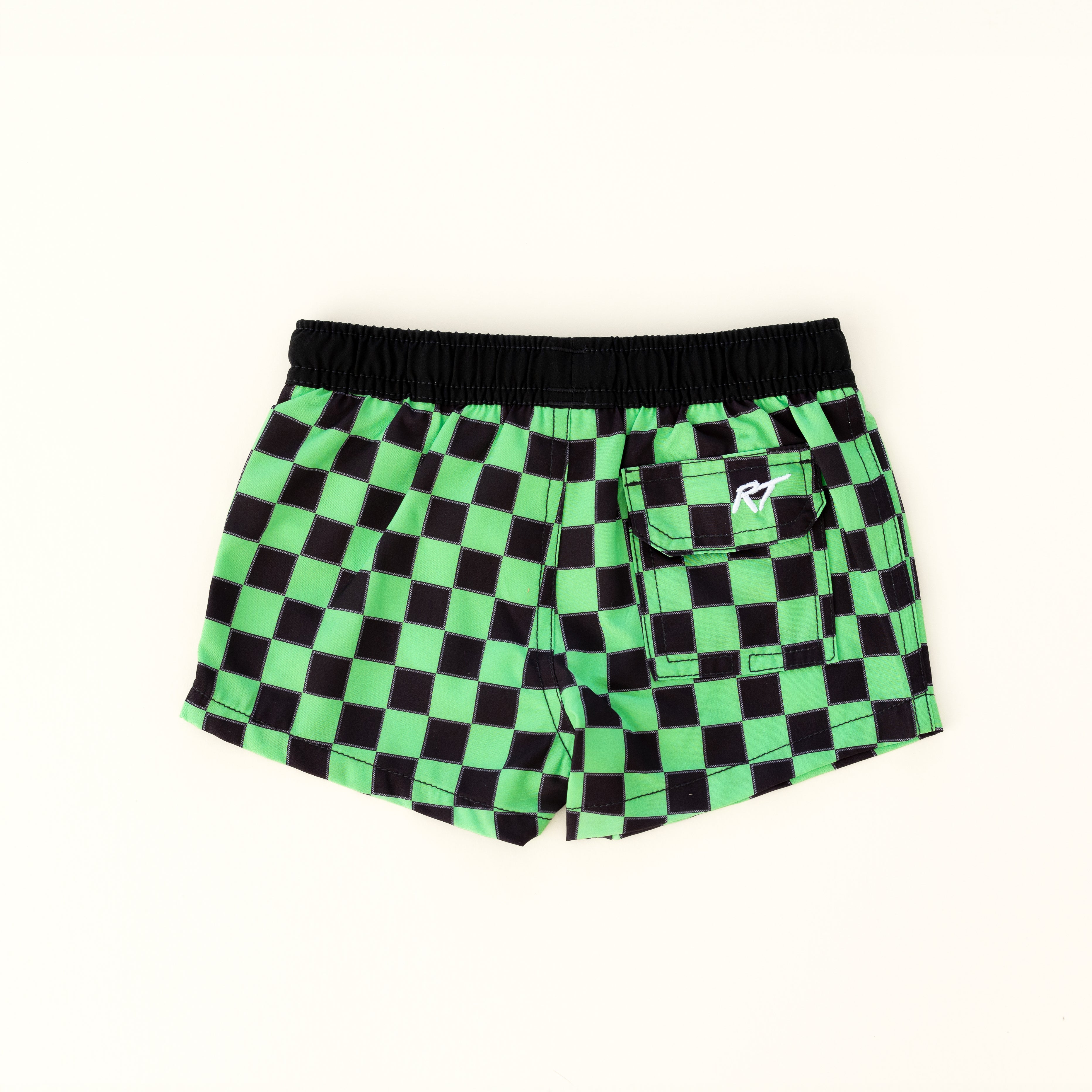 backside of Bright checkered swim shorts with an elastic waistband and drawstring, made from quick-drying fabric. Ideal for swimming, beach trips, and outdoor activities. Features vibrant patterns and a comfortable fit for active kids.