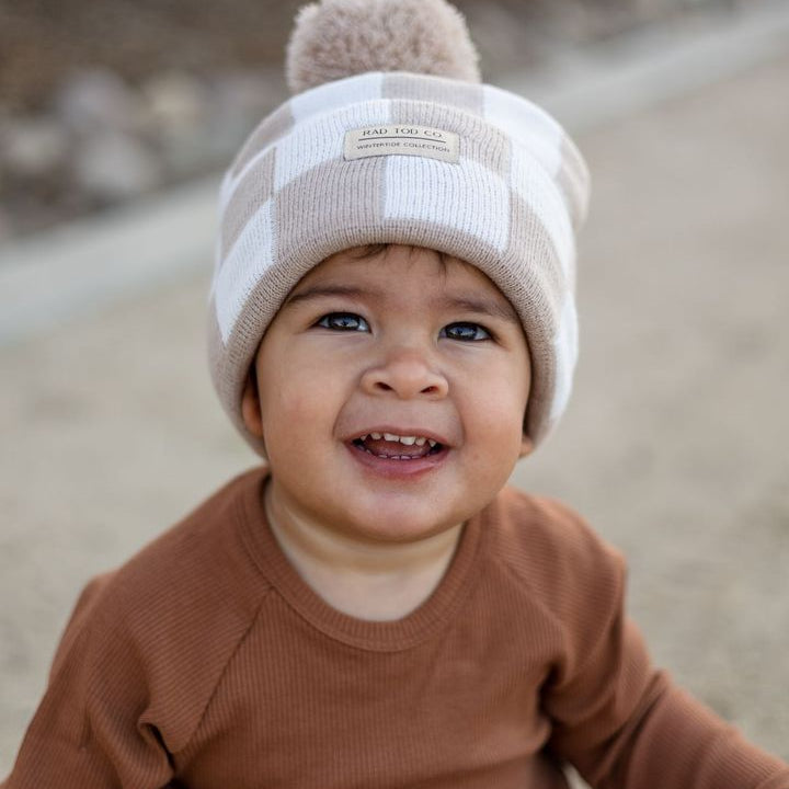 Child Wearing Tan Checkered beanie by rad toddler