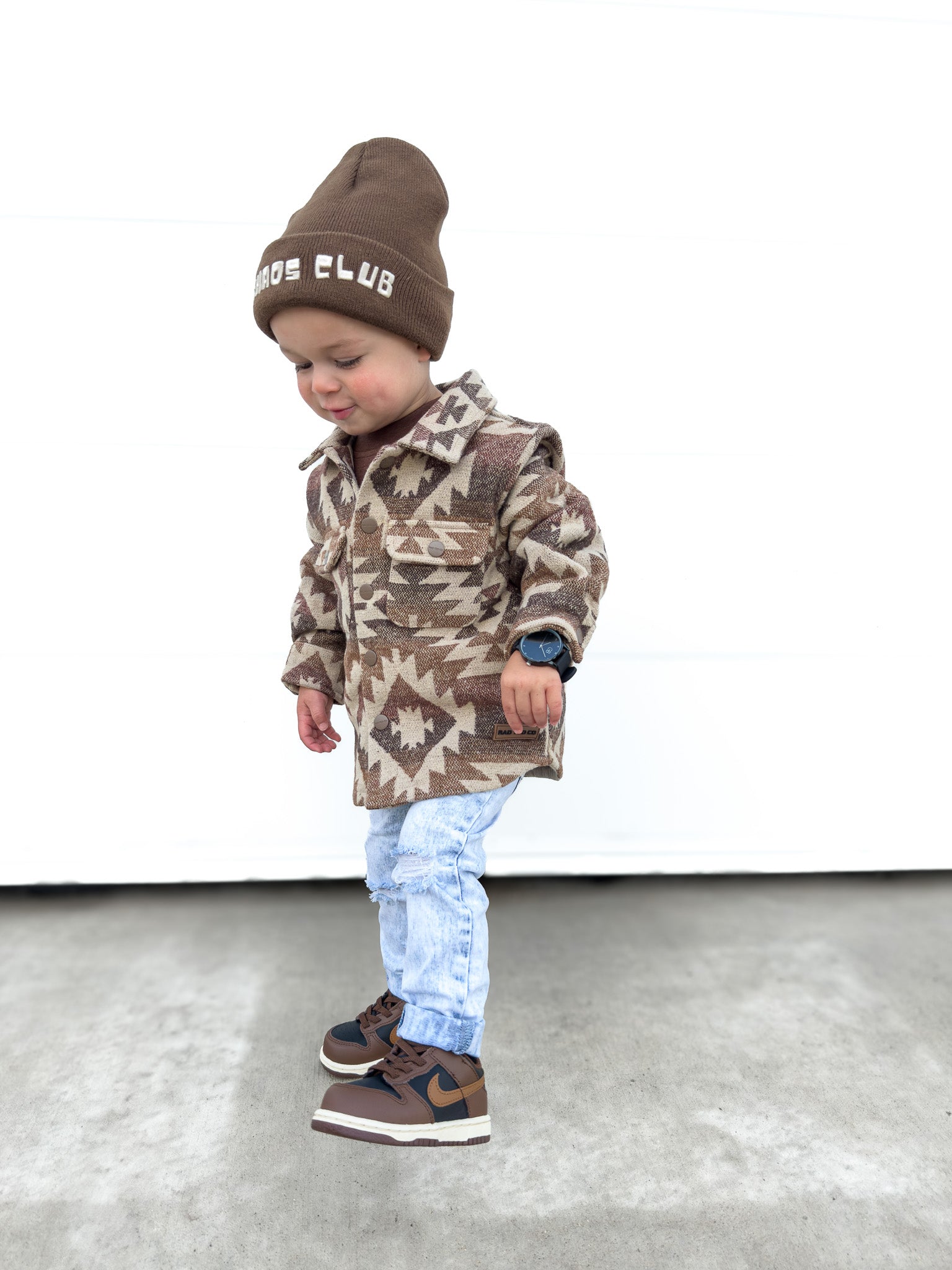 Boy wearing the Zion Jacket styled for fall with earthy tones and comfortable fit.