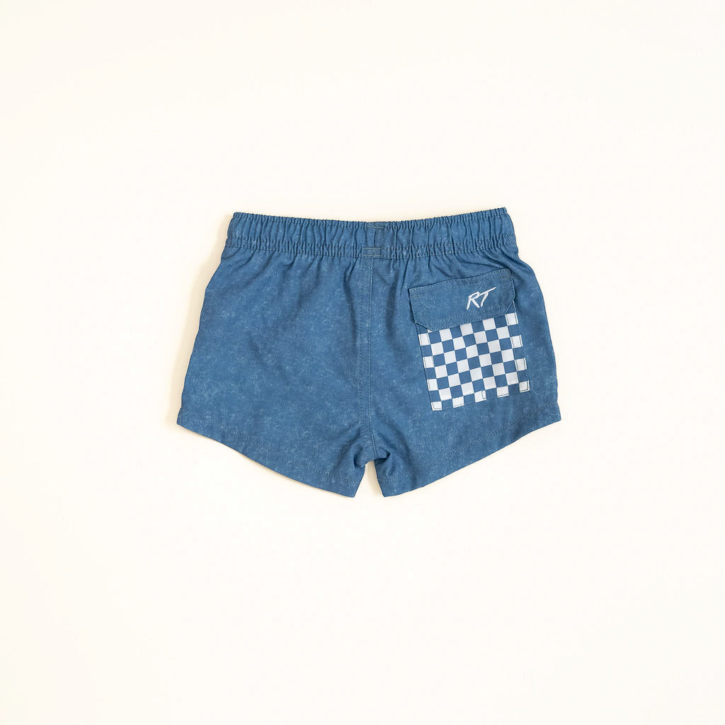 Blue shorts with a white checkered pattern on a white background backside by rad toddler