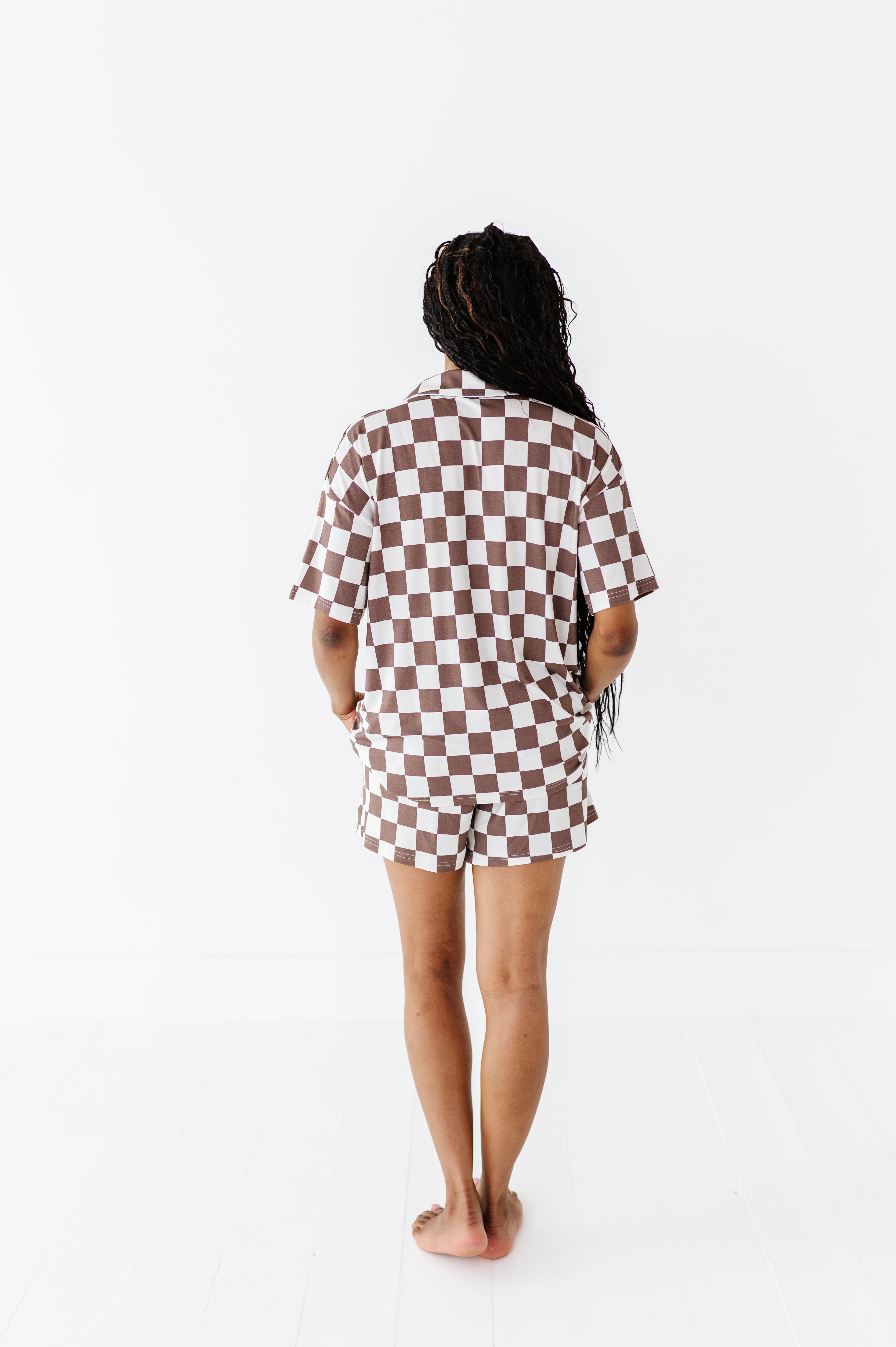 backside of Bronze and white checkered bamboo short sleeve pajama set for women, featuring a relaxed fit and elastic waistband by Rad Toddler.