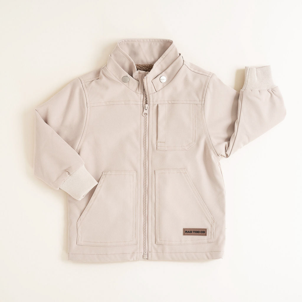 Beige children's jacket on a white background