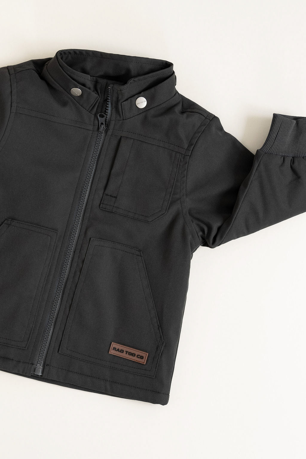 Close-up of Banxs Jacket custom button details