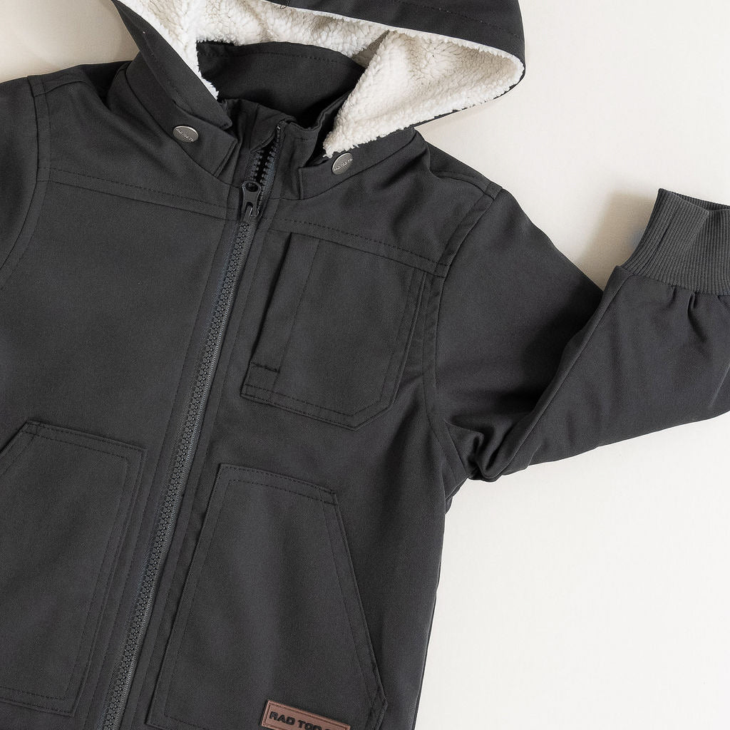 Black jacket with a hood on a white background