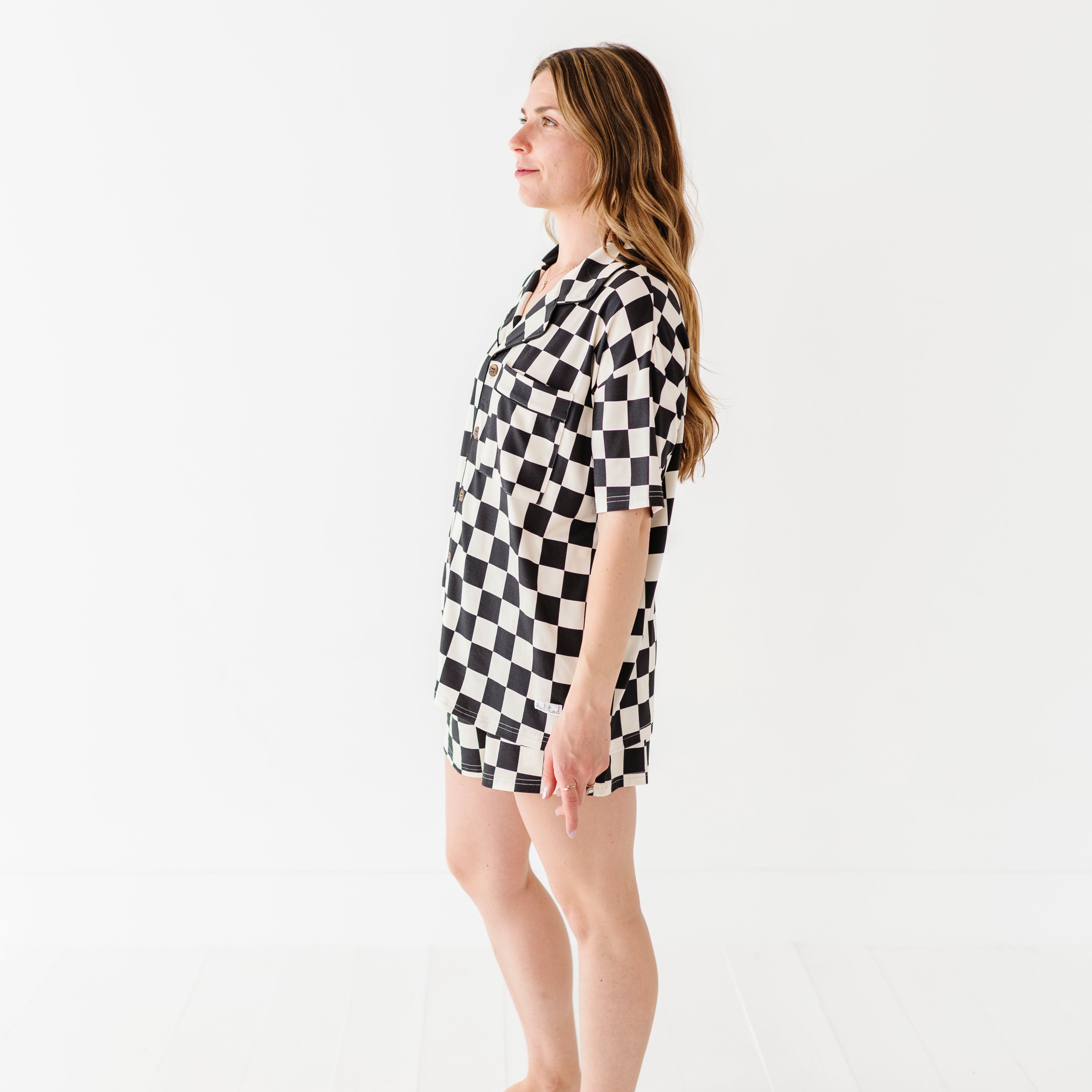 Black and white checkered bamboo short sleeve pajama set for women, featuring soft, breathable fabric and a relaxed fit by Rad Toddler.