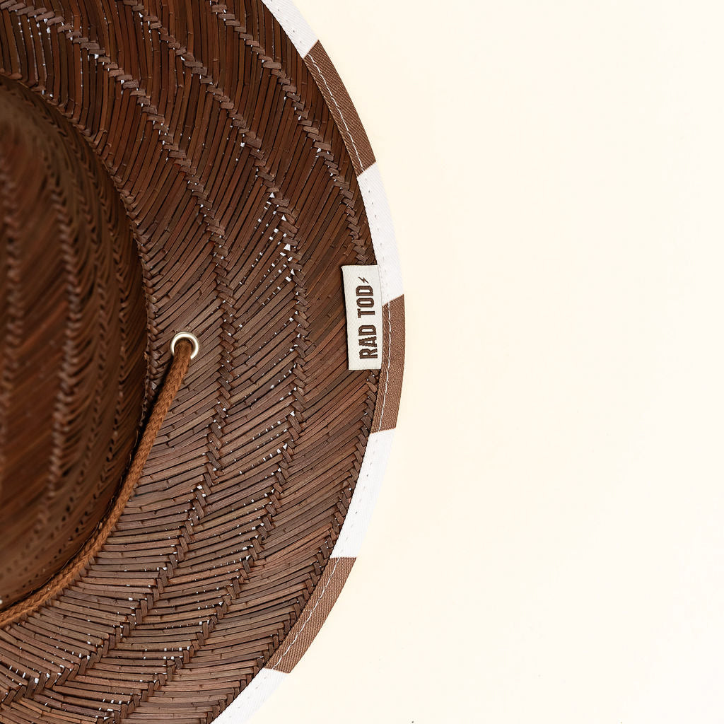 Dark straw hat with cacao colored checkers on bottom by Rad Toddler