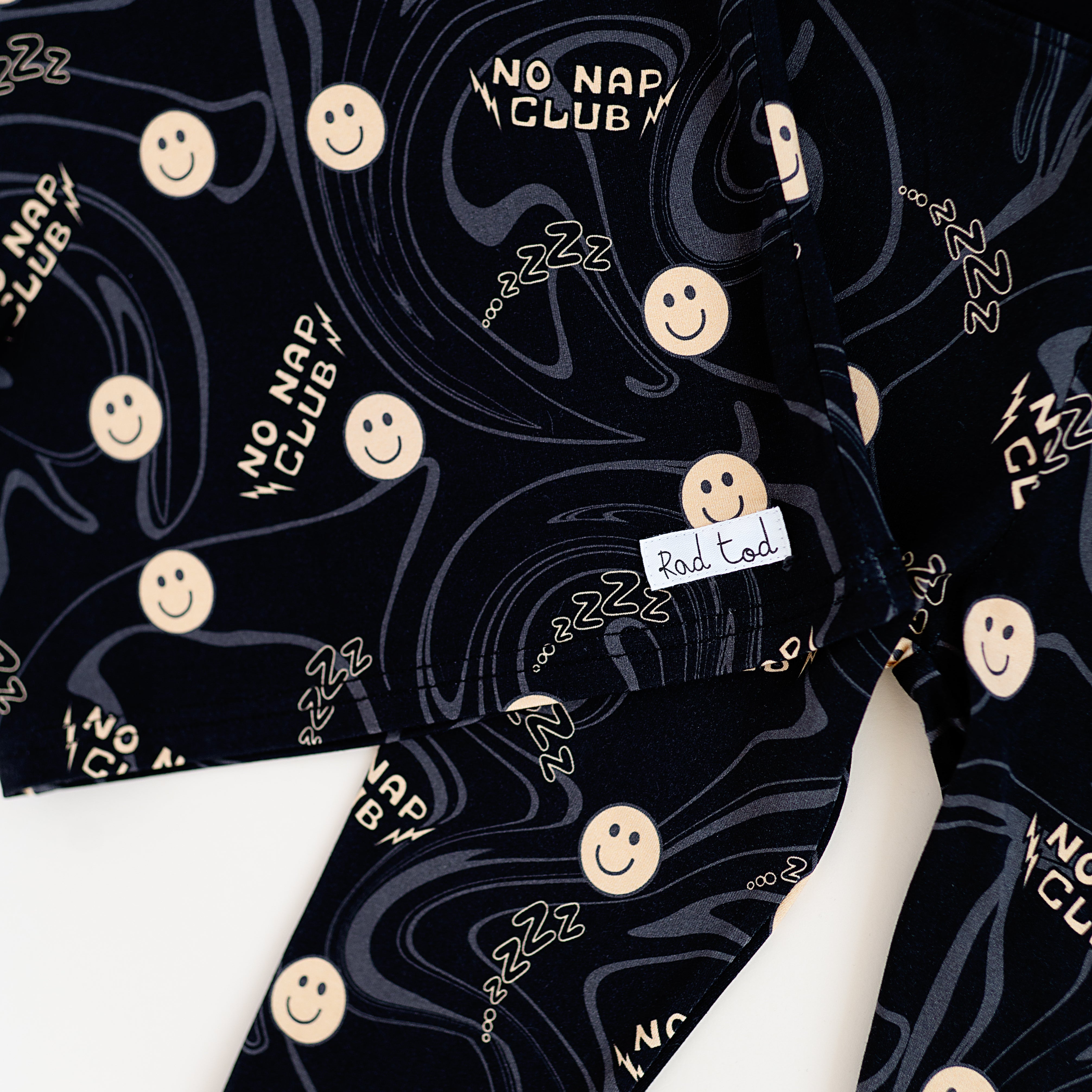 Cute No Nap Club bamboo 2-piece set featuring smiley face graphics and a wavy pattern