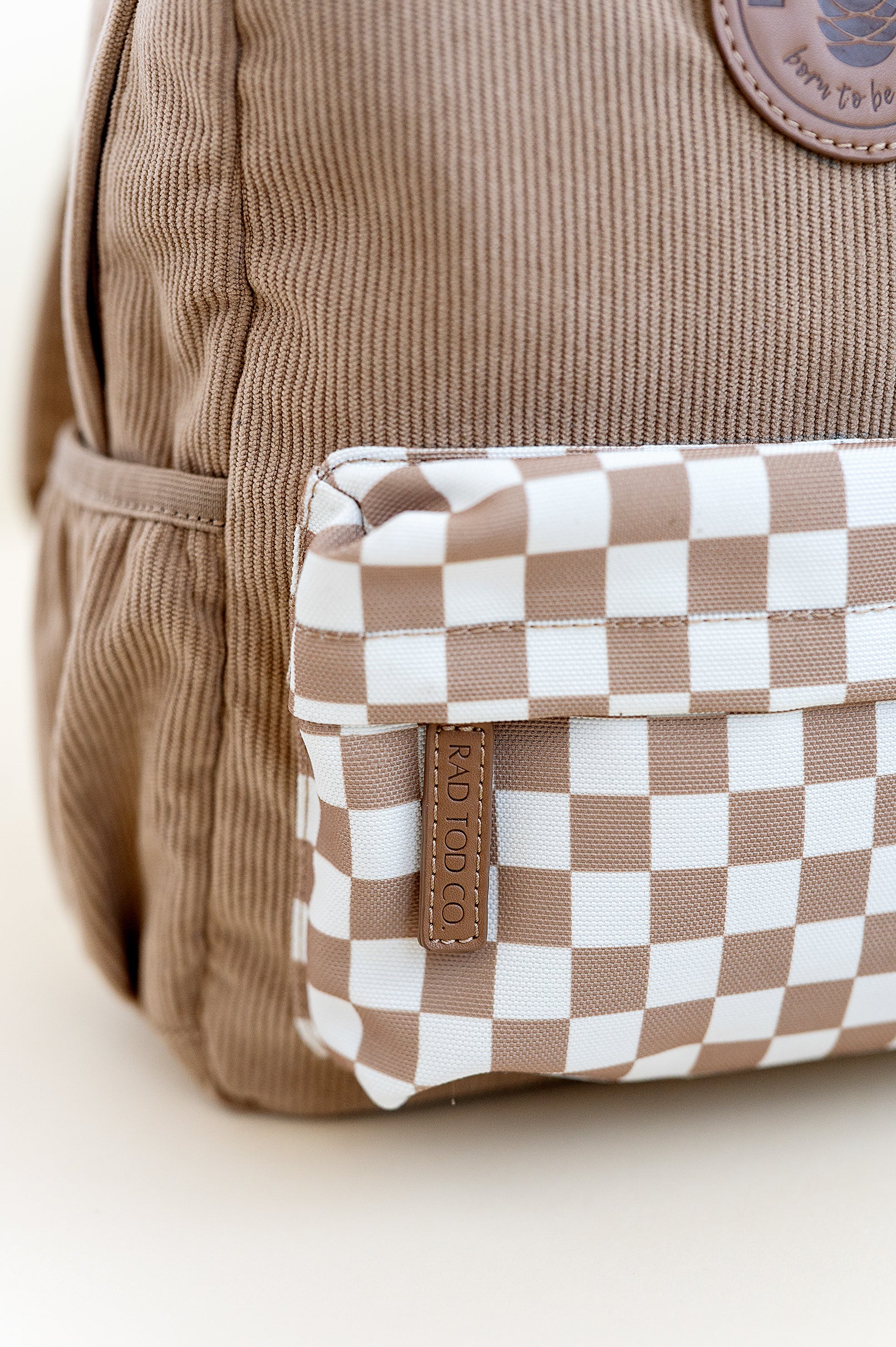 checker pouch on the dune toddler backpack