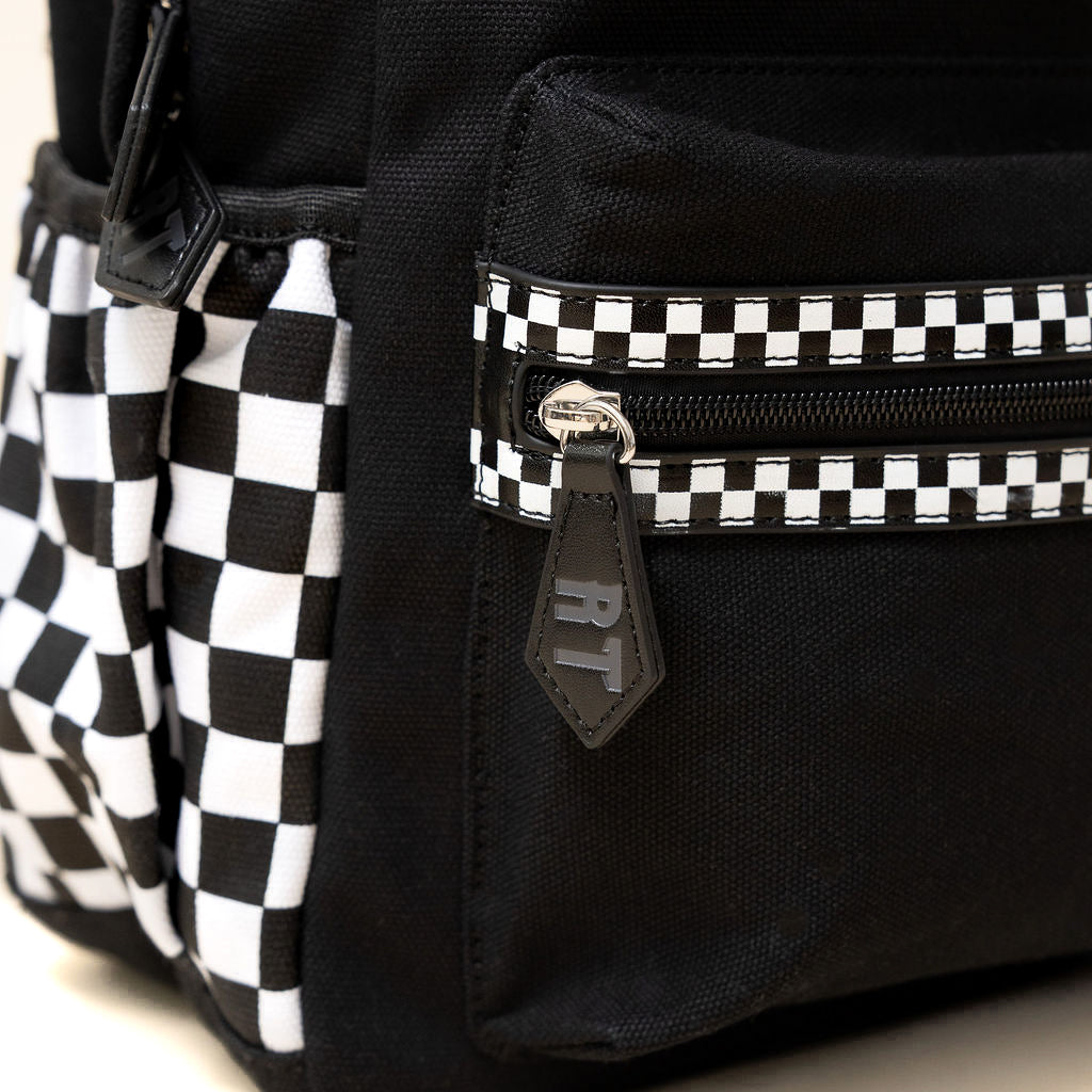 Close-up of Fast Lane backpack material and zipper detailing