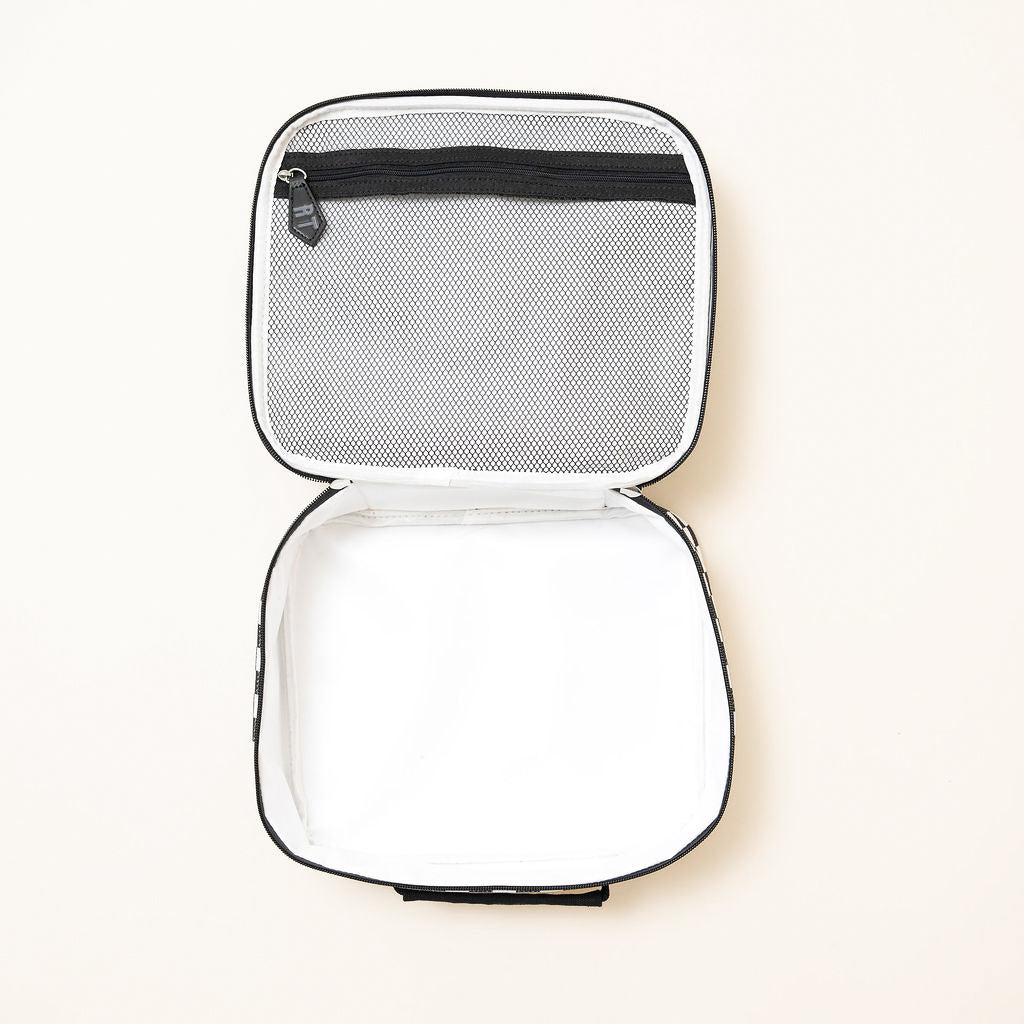 Inside Fast Lane lunchbox showing insulated compartment for snacks and meals
