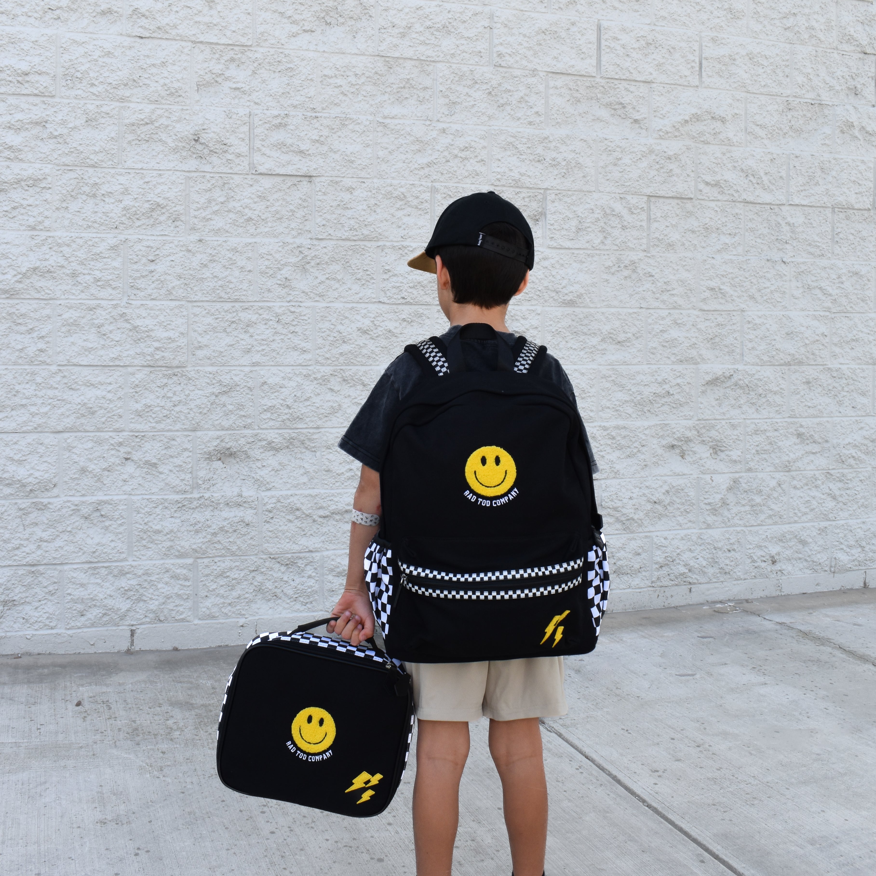 Child wearing Fast Lane backpack with adjustable straps, comfortable everyday fit