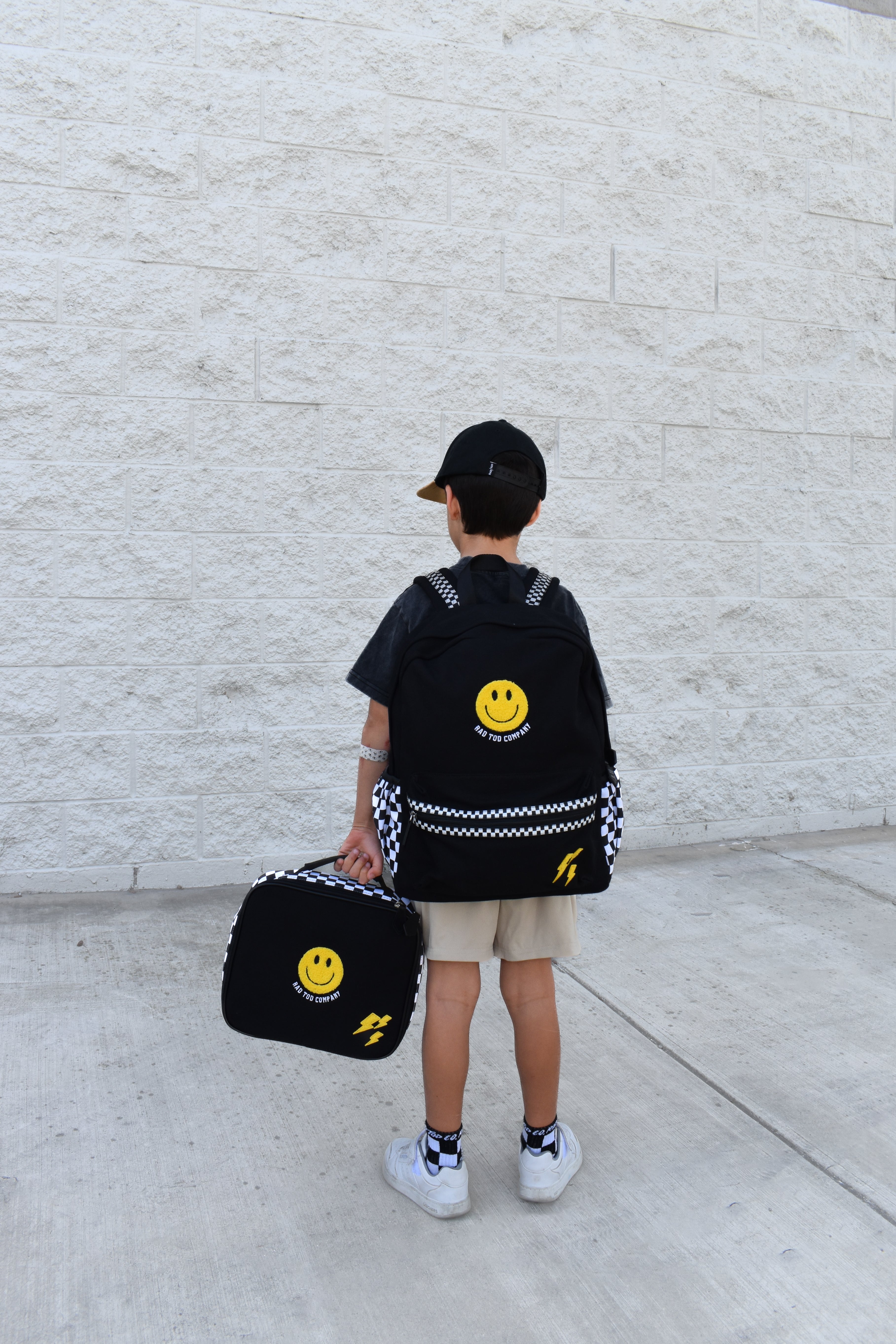 Child wearing Fast Lane backpack with adjustable straps, comfortable everyday fit