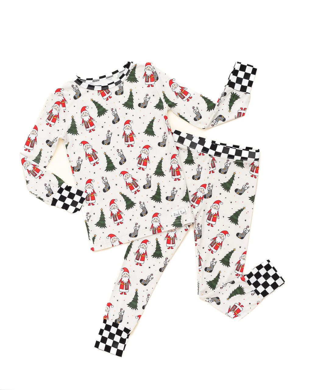 Soft, breathable bamboo pajamas for kids featuring Santa and Christmas trees by RAD TODDLER