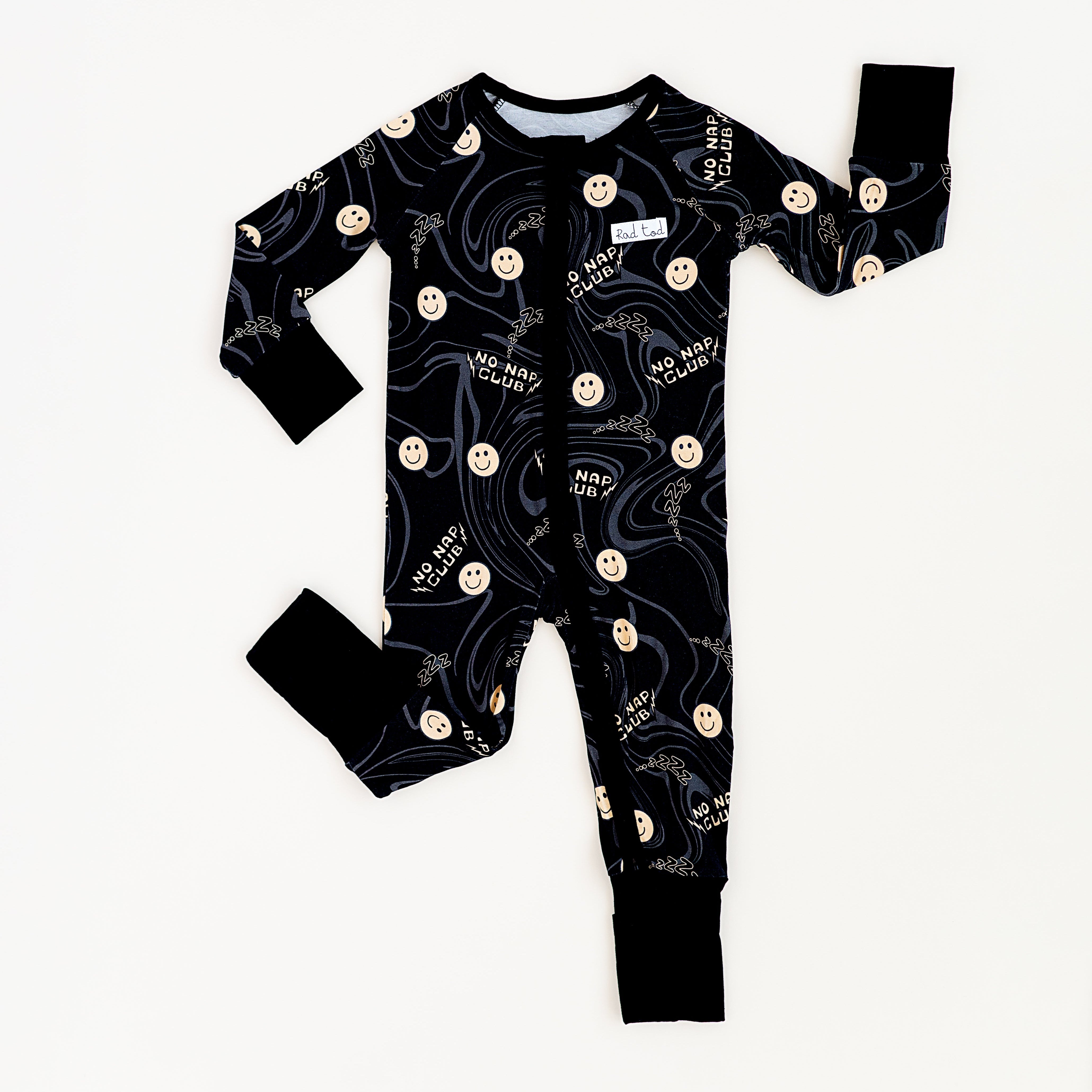 No Nap Club bamboo onesie for toddlers with yellow smiley faces and wavy line pattern
