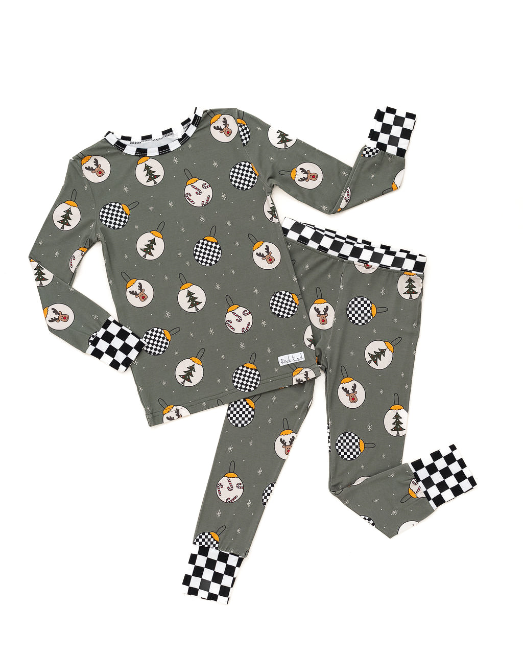 Pine green kids holiday pajamas with festive ornament design