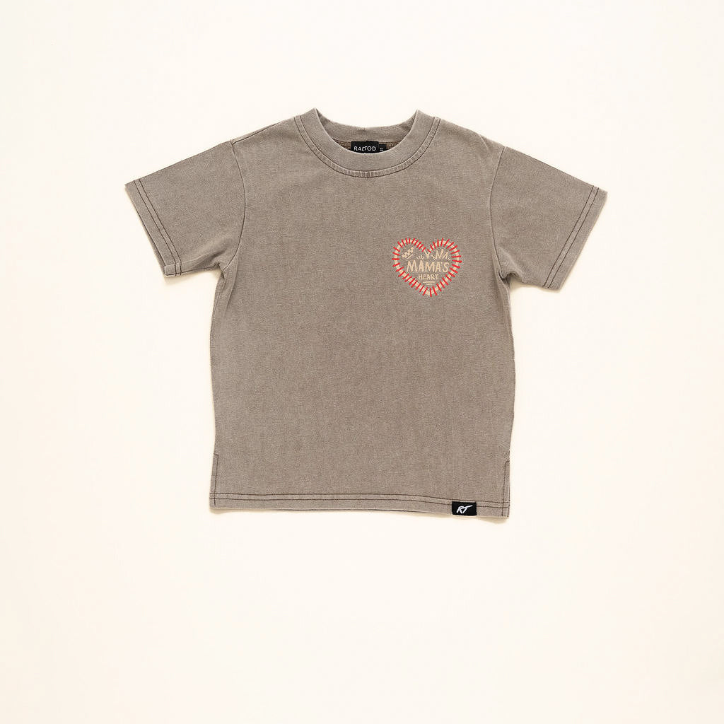 Beige t-shirt with a heart-shaped logo on a beige background