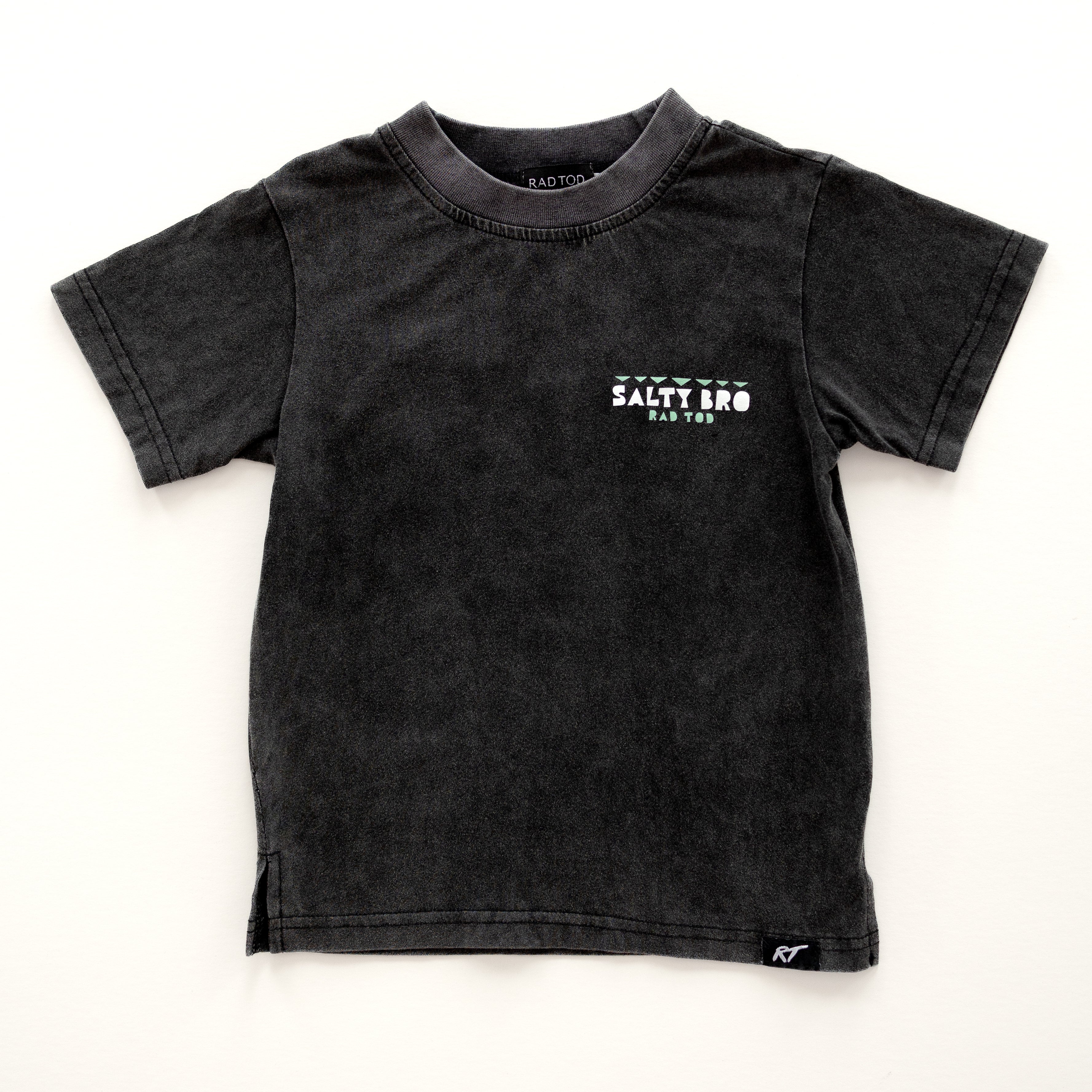 Front side Rad Toddler black acid wash toddler tee with bold 'Salty Bro' text in playful, beach style lettering