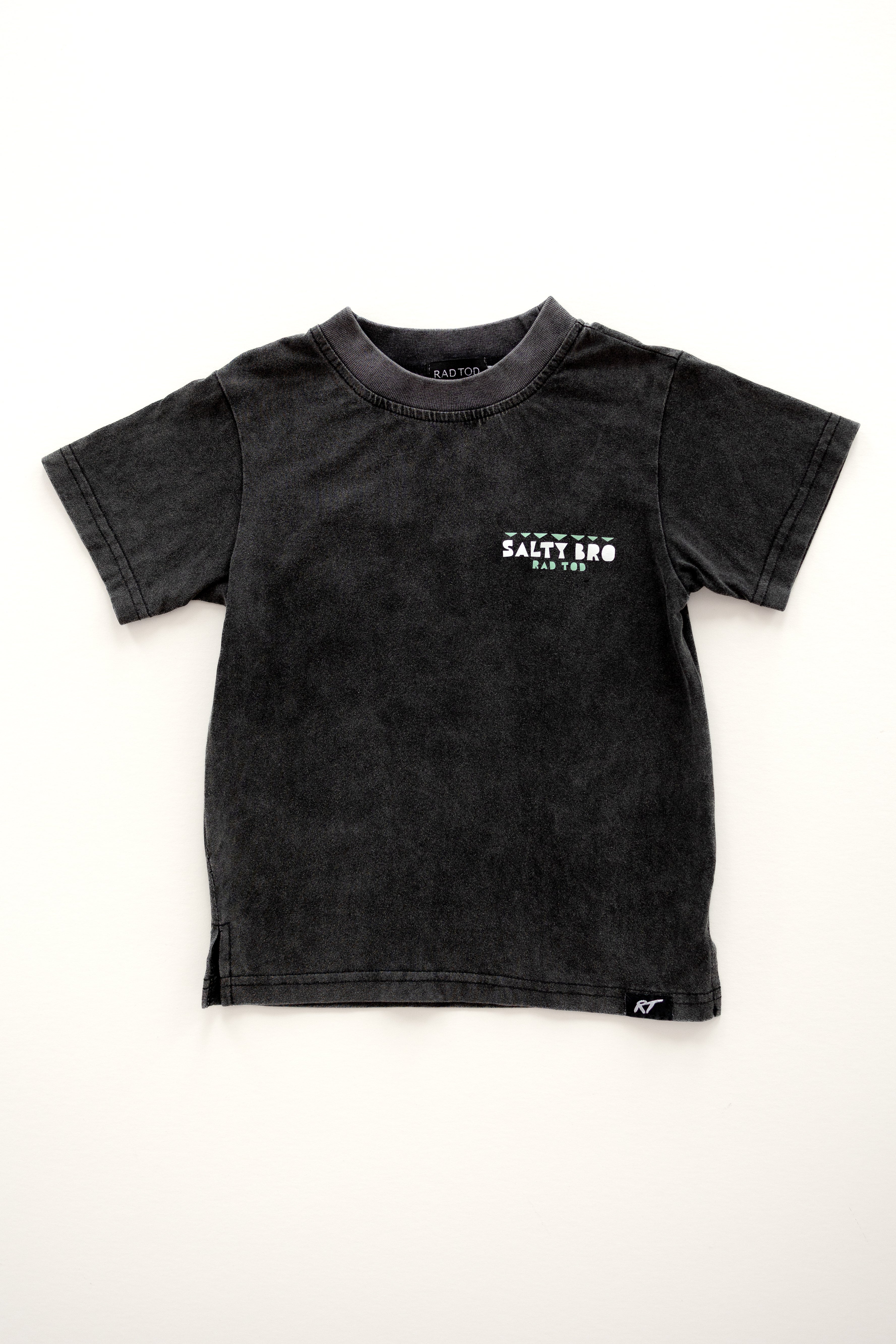 Front side Rad Toddler black acid wash toddler tee with bold 'Salty Bro' text in playful, beach style lettering