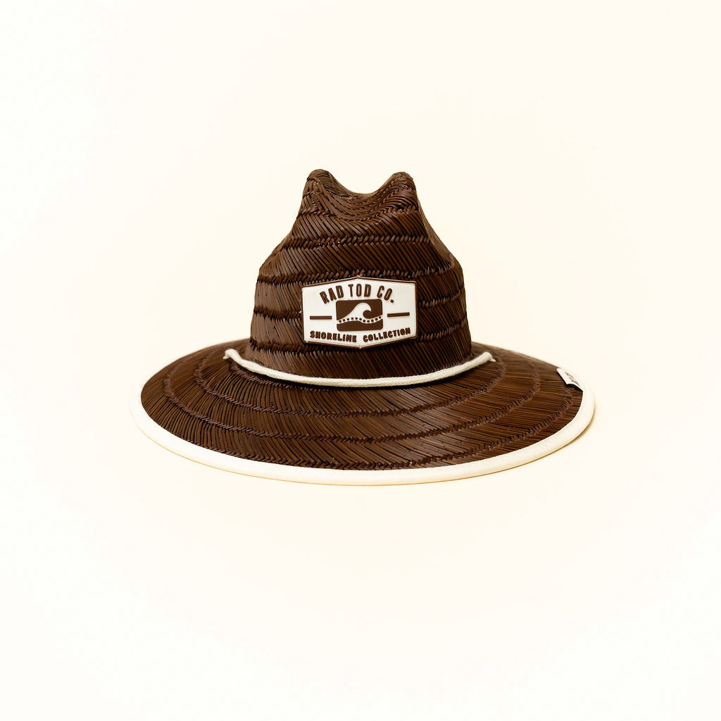 front of Sandbar straw hat with dark straw exterior and beige detail under the brim, wide brim providing sun protection for face, ears, and neck by Rad Toddler