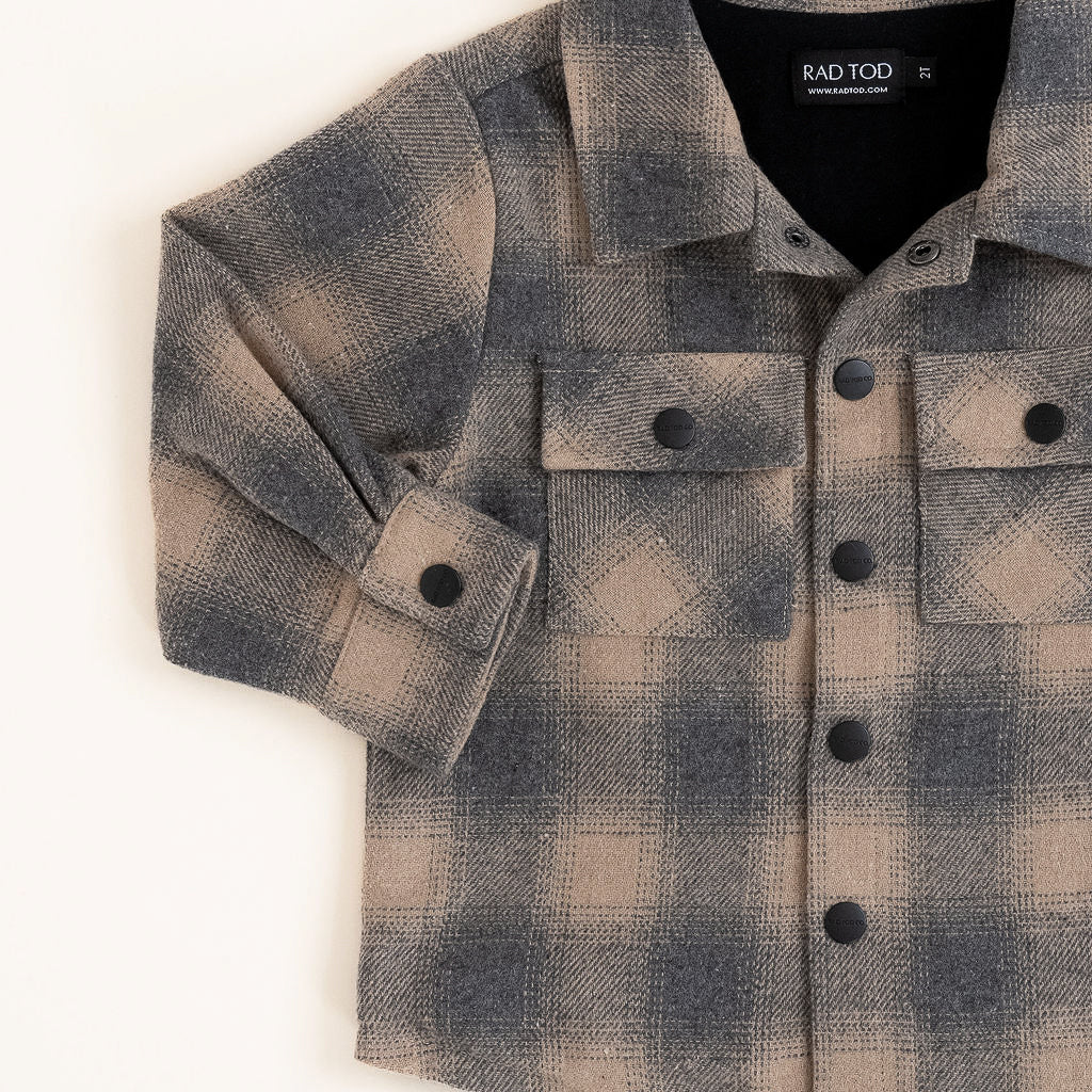 Flat lay of the Sandstorm Toddler Shacket with soft cotton lining.