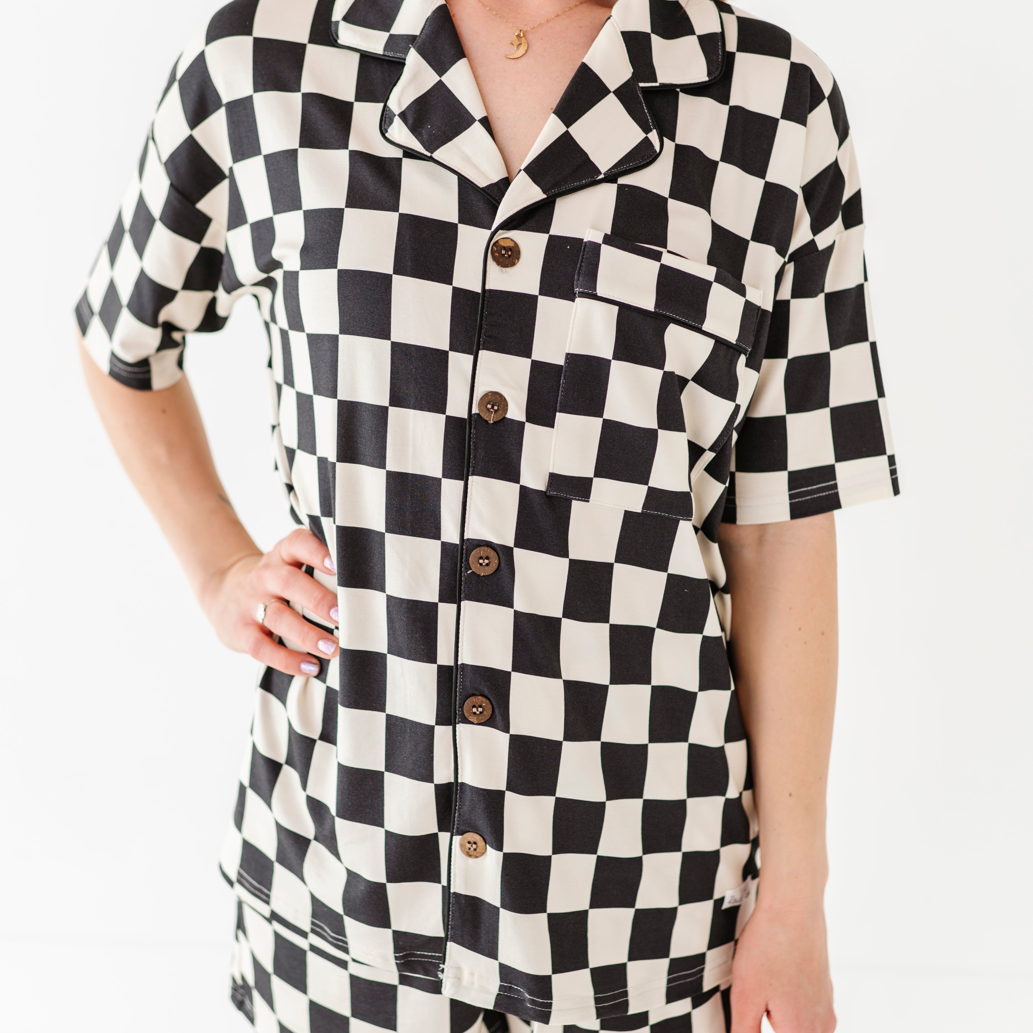Black and white checkered bamboo short sleeve pajama set for women, featuring soft, breathable fabric and a relaxed fit by Rad Toddler.