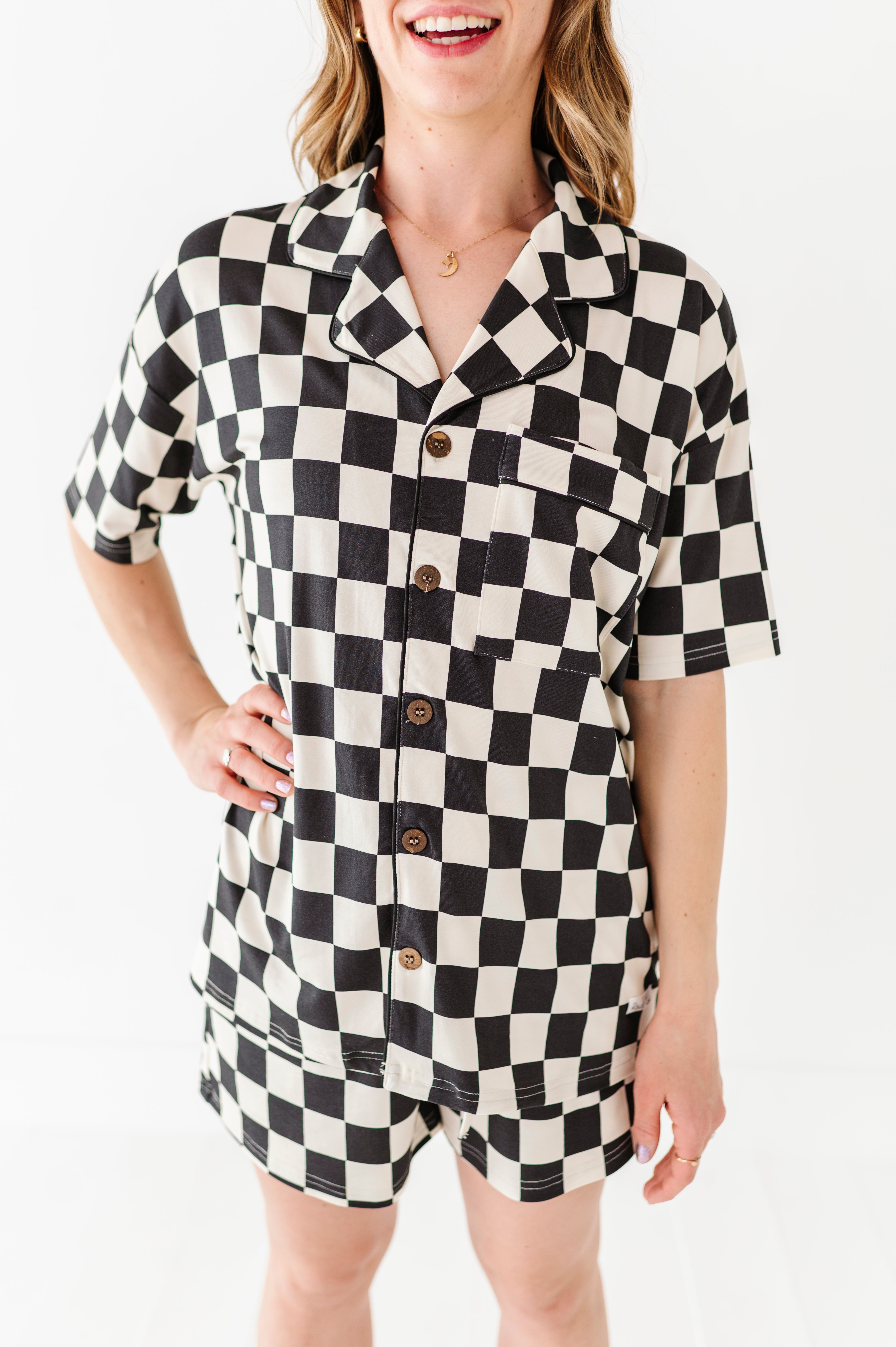 Black and white checkered bamboo short sleeve pajama set for women, featuring soft, breathable fabric and a relaxed fit by Rad Toddler.
