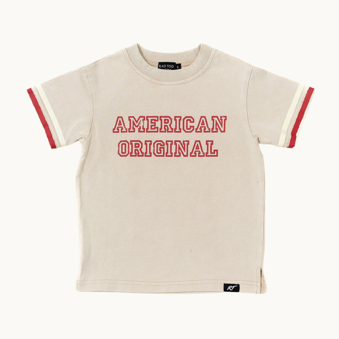 Beige t-shirt with 'American Original' text on a white background