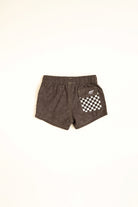Brown shorts with a checkered pocket on a white background
