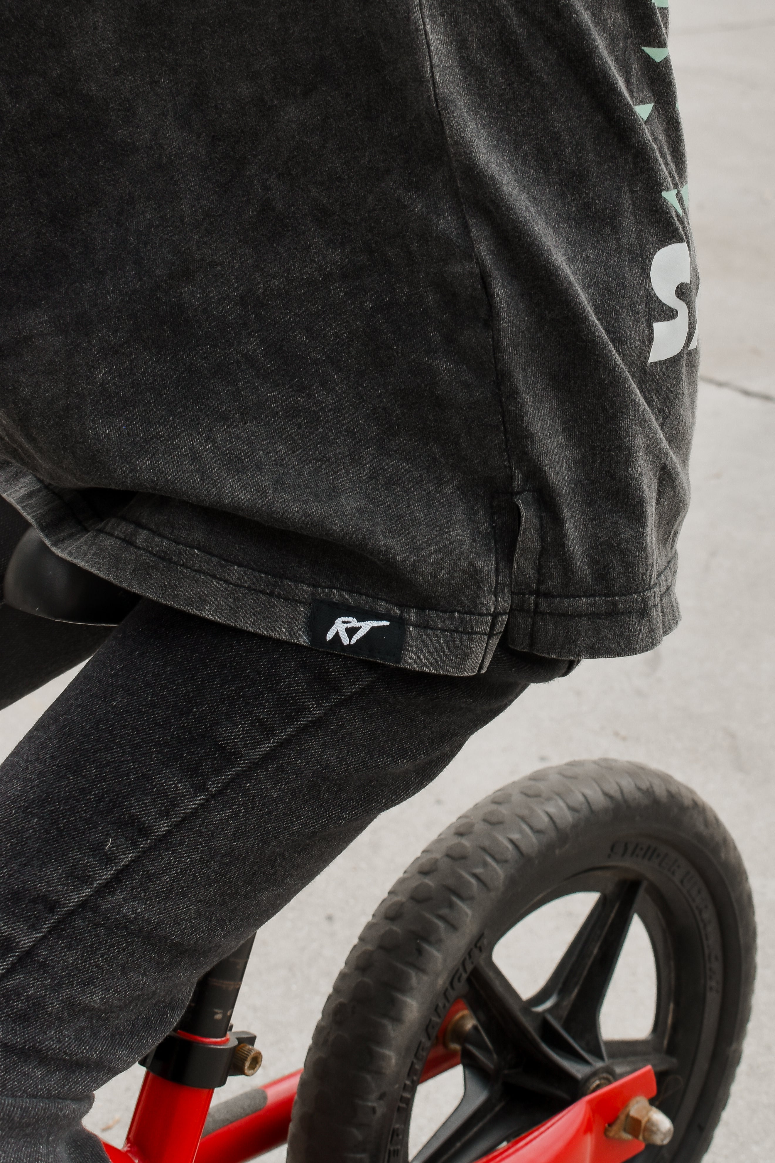 details on the Rad Toddler black acid wash toddler tee with bold 'Salty Bro' text in playful, beach style lettering 