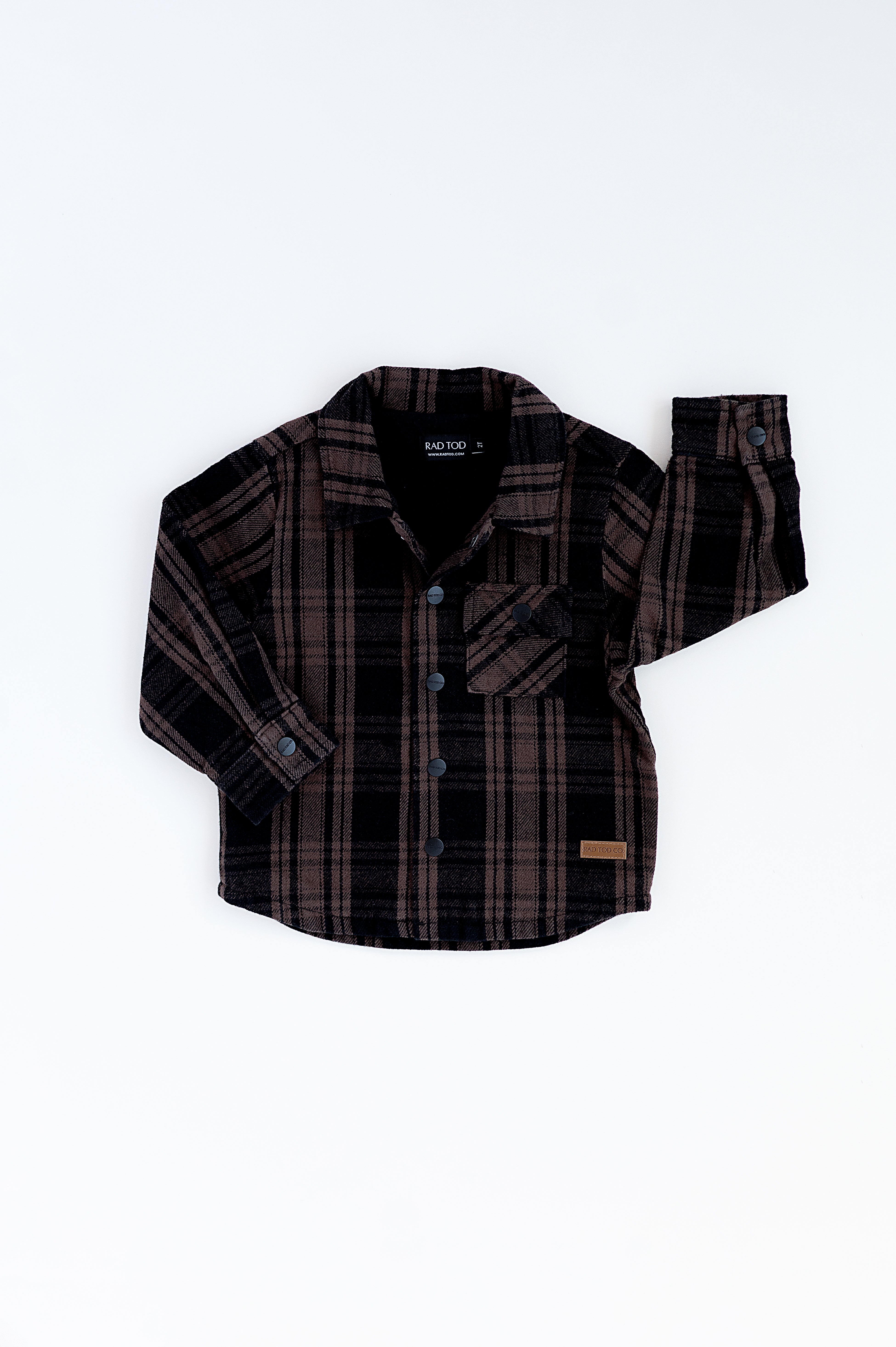 A bronze plaid shacket for  toddler boys of 5t with long sleeves, button-up front, and a collar.