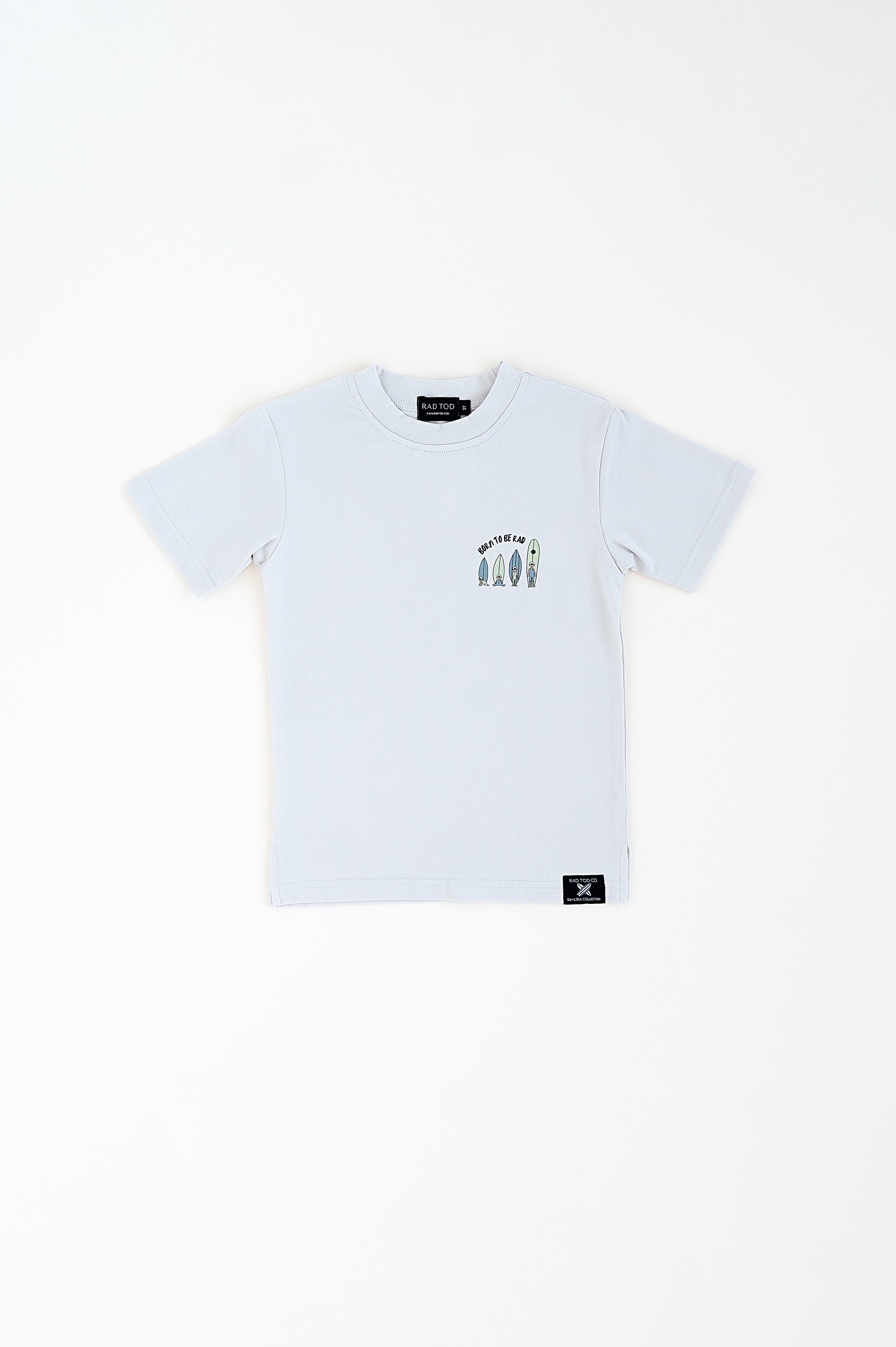 front side of a Trendy toddler t-shirt with vibrant designs for comfortable everyday wear that features a baby surfer growing up into a toddler