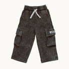 A pair of children's espresso acid-wash cargo pants with a white drawstring and a small white brand patch on the side pocket, shown against a plain off-white background.
