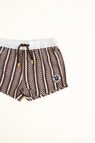 Striped shorts with a logo on a white background