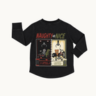 A black long-sleeve t-shirt with a graphic print on the back, featuring the text 'NAUGHTY vs NICE' above two claw machine illustrations, shown on a light off-white background.