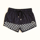Black shorts with checkered trim on a white background