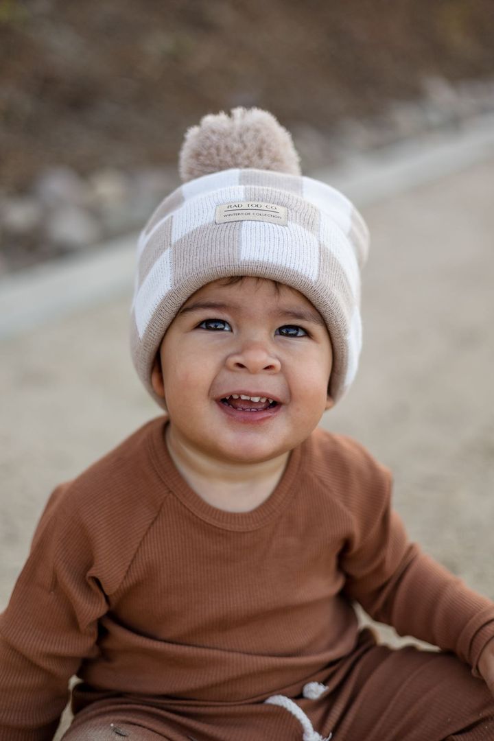 Child Wearing Tan Checkered beanie by rad toddler