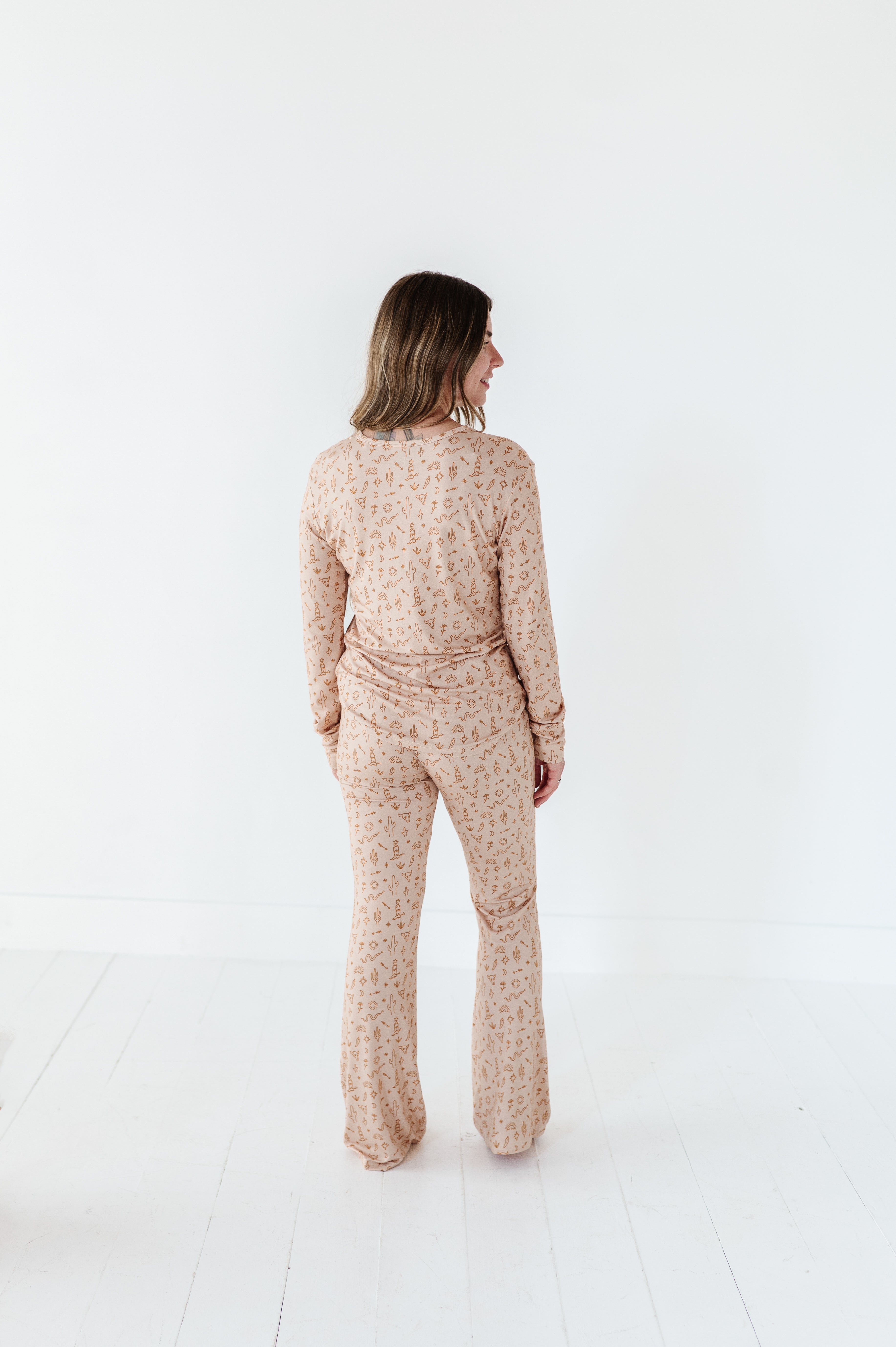 back of Women’s A Little Bit Country Bamboo Pajamas, designed by a mom, feature a desert-inspired design for ultimate comfort. Perfectly matching with your baby’s coordinating set for a stylish, cozy bedtime look.
