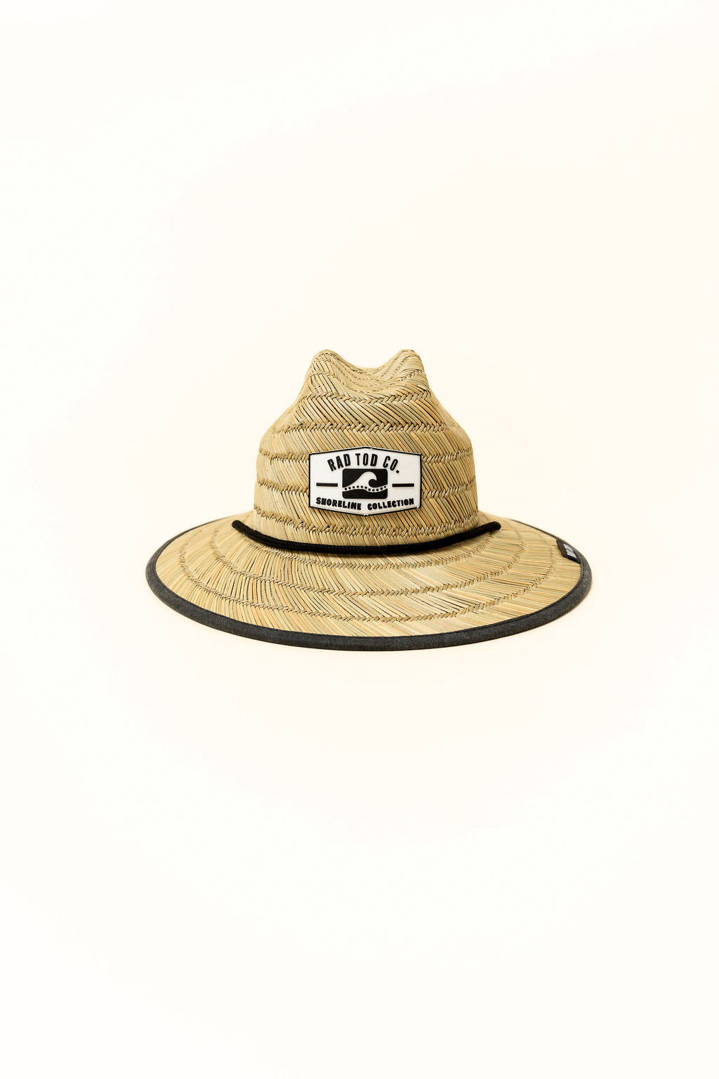 Acid Wash Black straw hat with classic straw exterior and black acid wash detail under the brim, wide brim providing sun protection for face, ears, and neck.