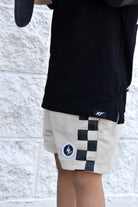 Sand check shorts with relaxed fit, lightweight polyester fabric, and everyday streetwear style by rad toddler