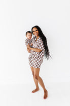 baby and mom wearing Bronze and white checkered bamboo short sleeve pajama set for women, featuring a relaxed fit and elastic waistband by Rad Toddler.