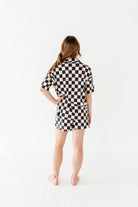 backside of Black and white checkered bamboo short sleeve pajama set for women, featuring soft, breathable fabric and a relaxed fit by Rad Toddler.