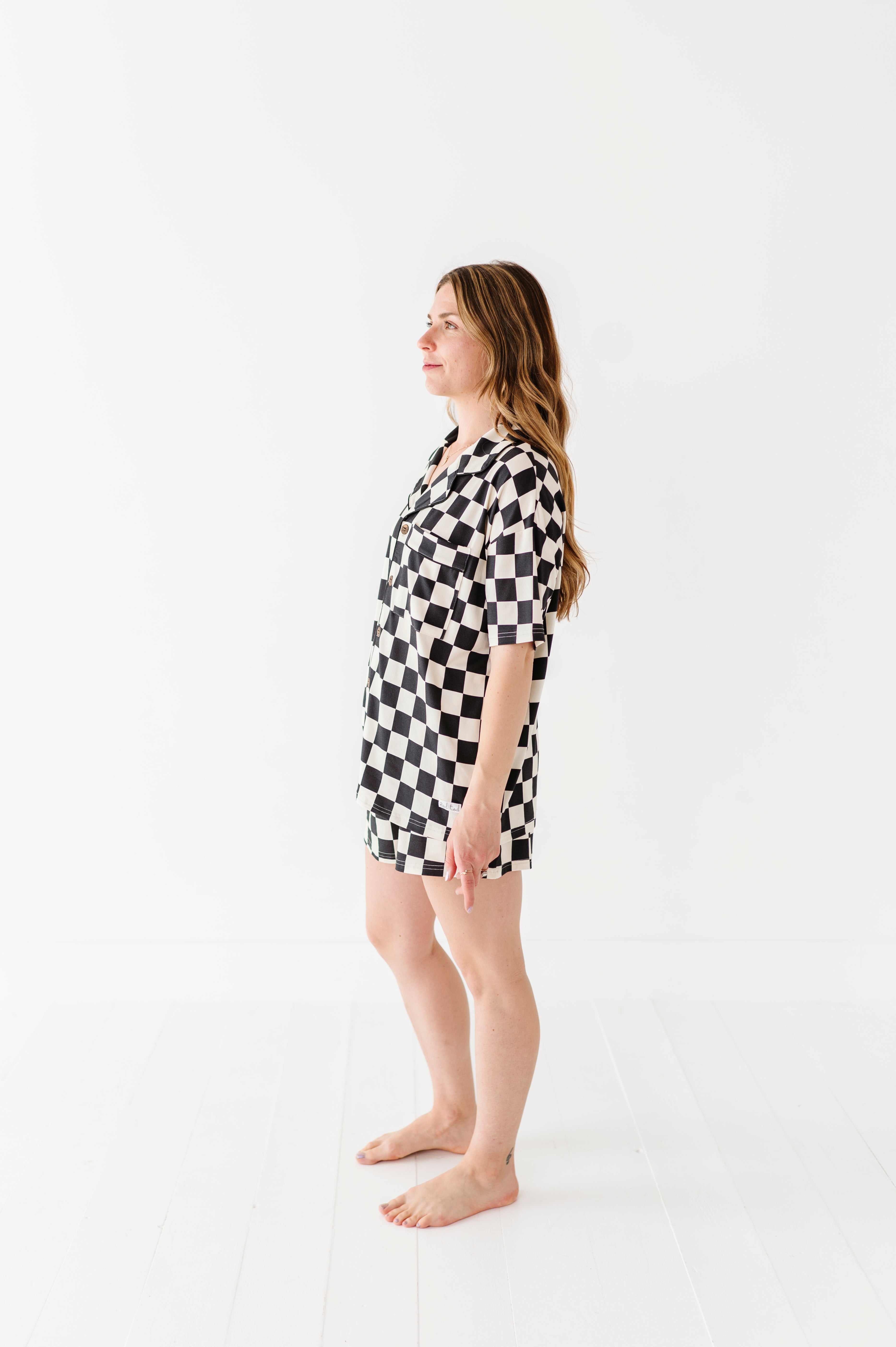 Black and white checkered bamboo short sleeve pajama set for women, featuring soft, breathable fabric and a relaxed fit by Rad Toddler.