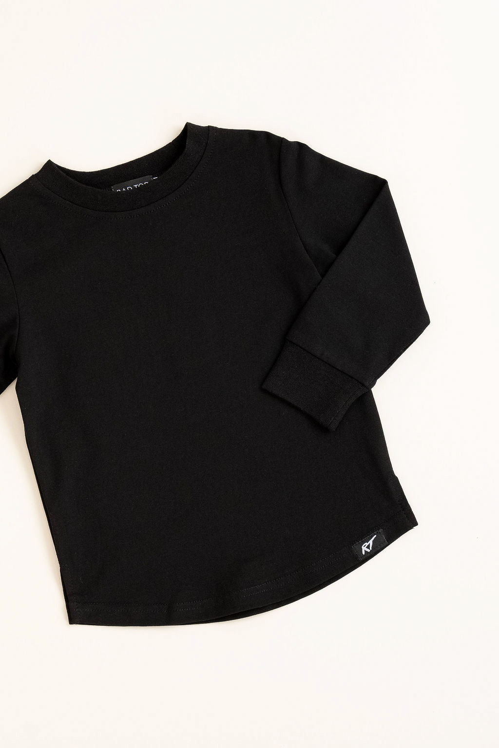 Black long-sleeve shirt on a white background