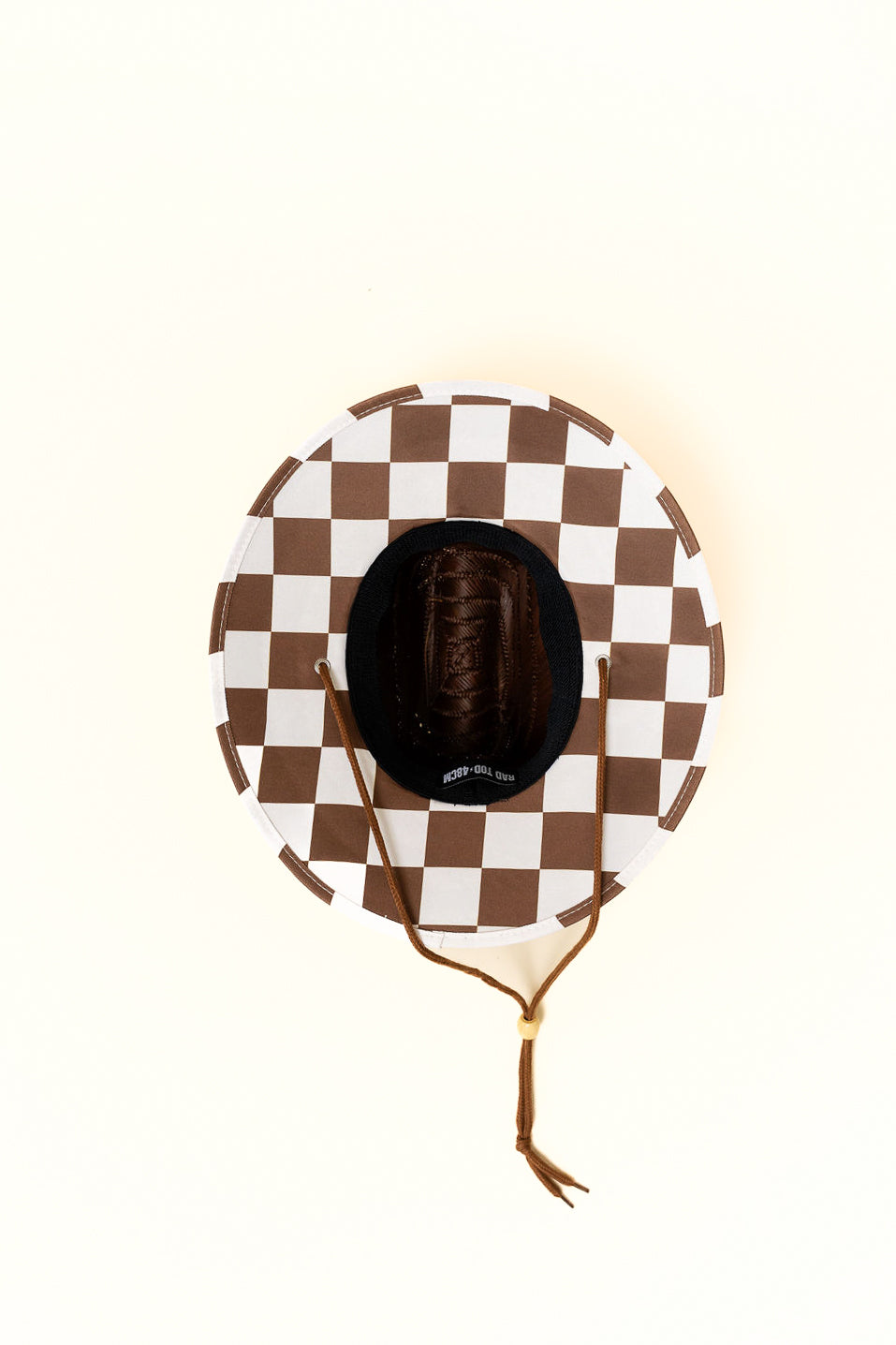 Dark straw hat with cacao colored checkers on bottom by Rad Toddler