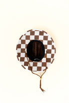 Dark straw hat with cacao colored checkers on bottom by Rad Toddler