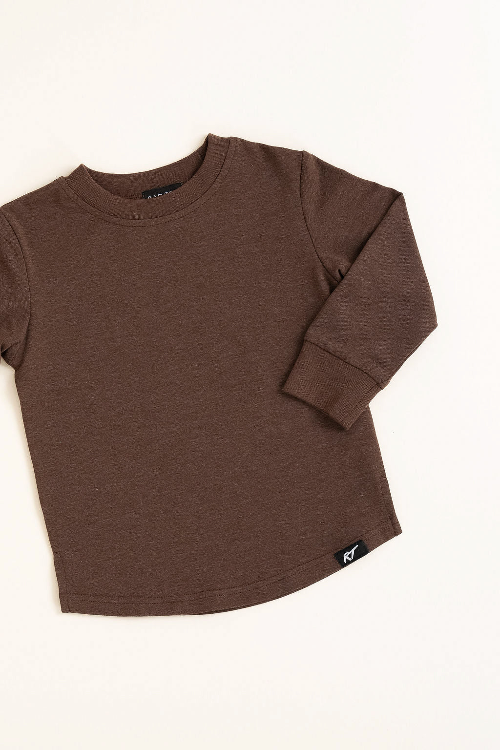 Brown long-sleeve shirt on a white background